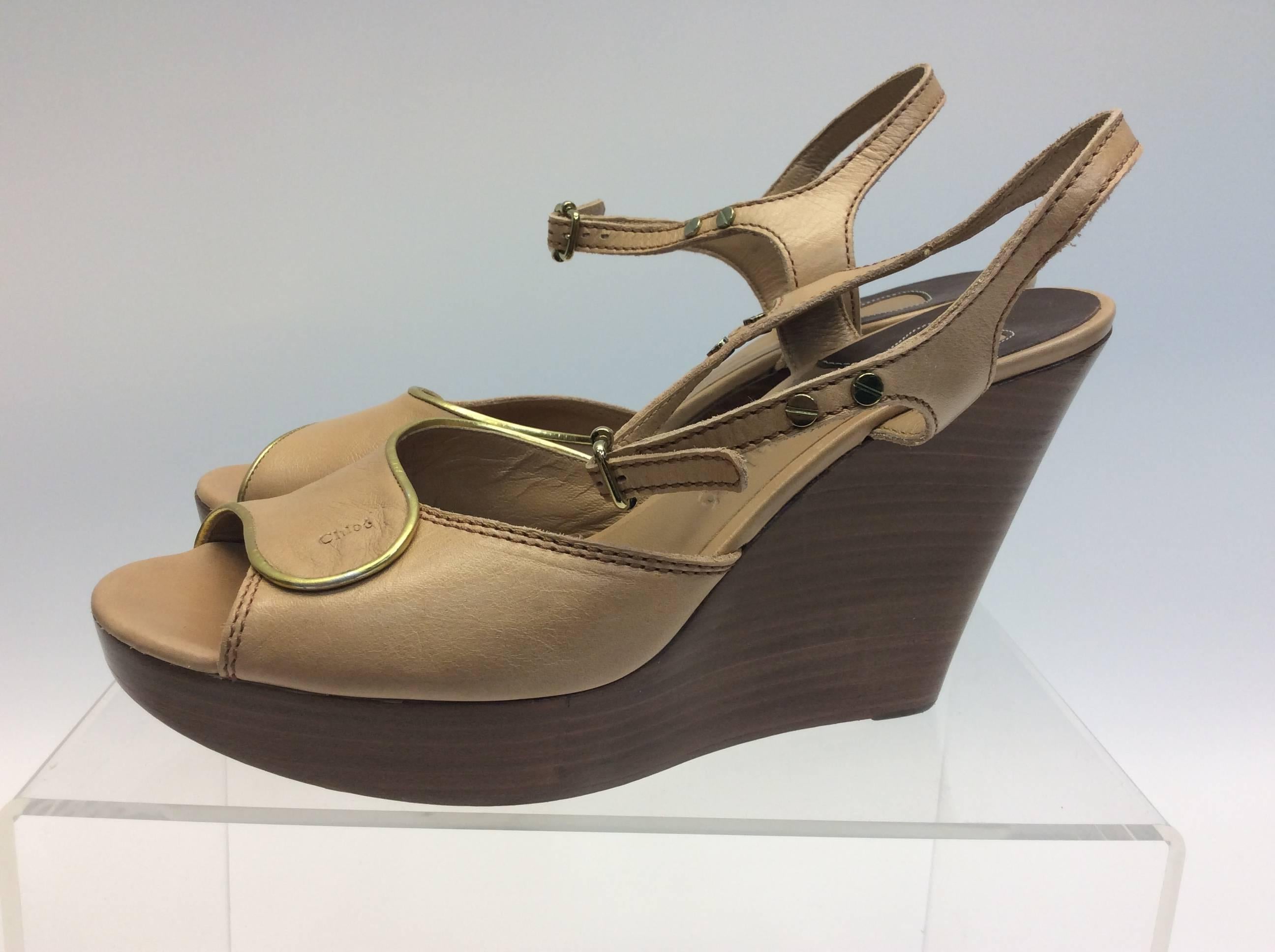 Chloe Tan Leather Wedge
$136
Made in Italy
Leather
Size 40
1” platform 
4” heel
