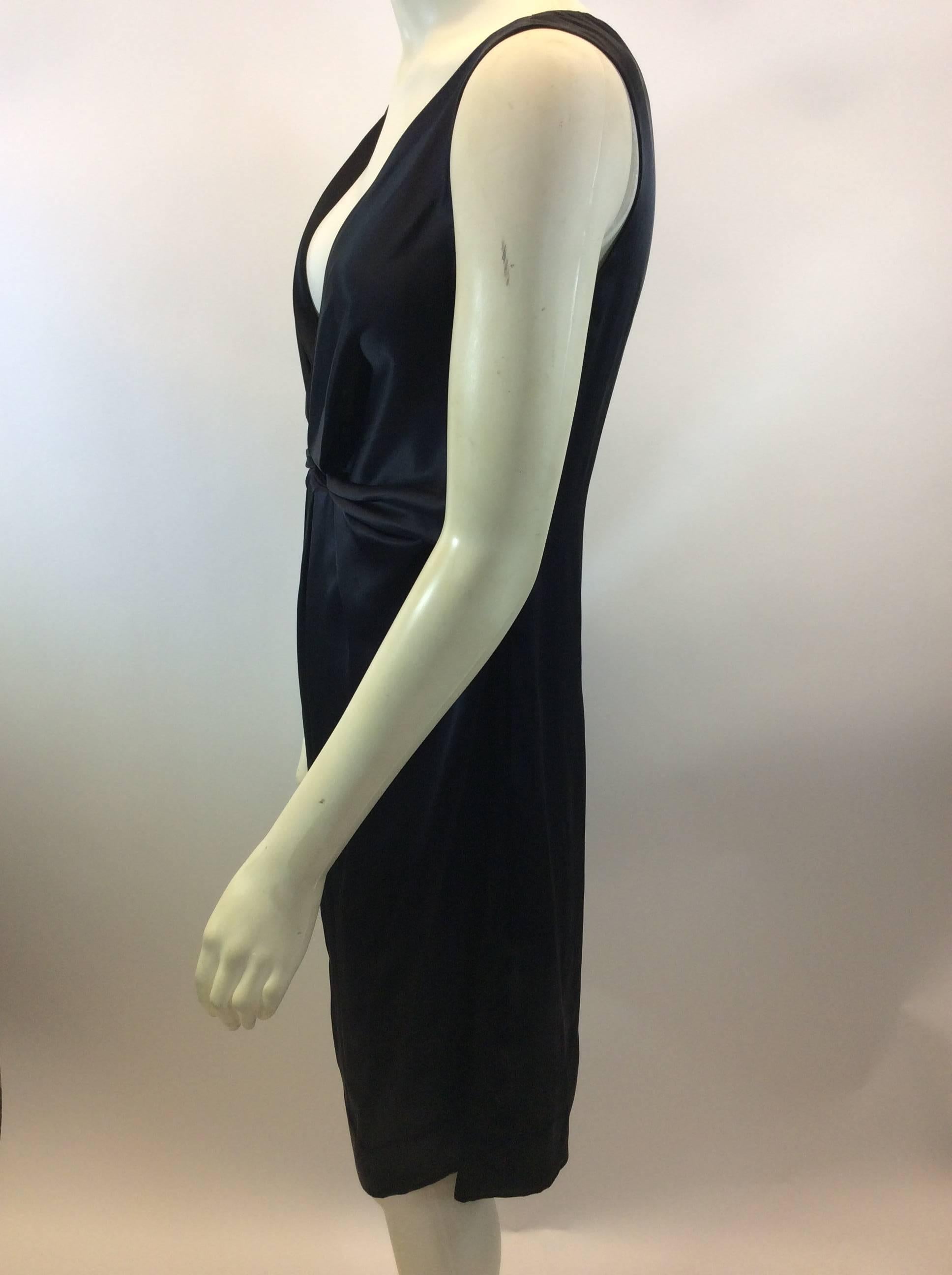 Prada Black Silk Dress
$299
Made in Italy
100% Silk
Size 40
Length 36
