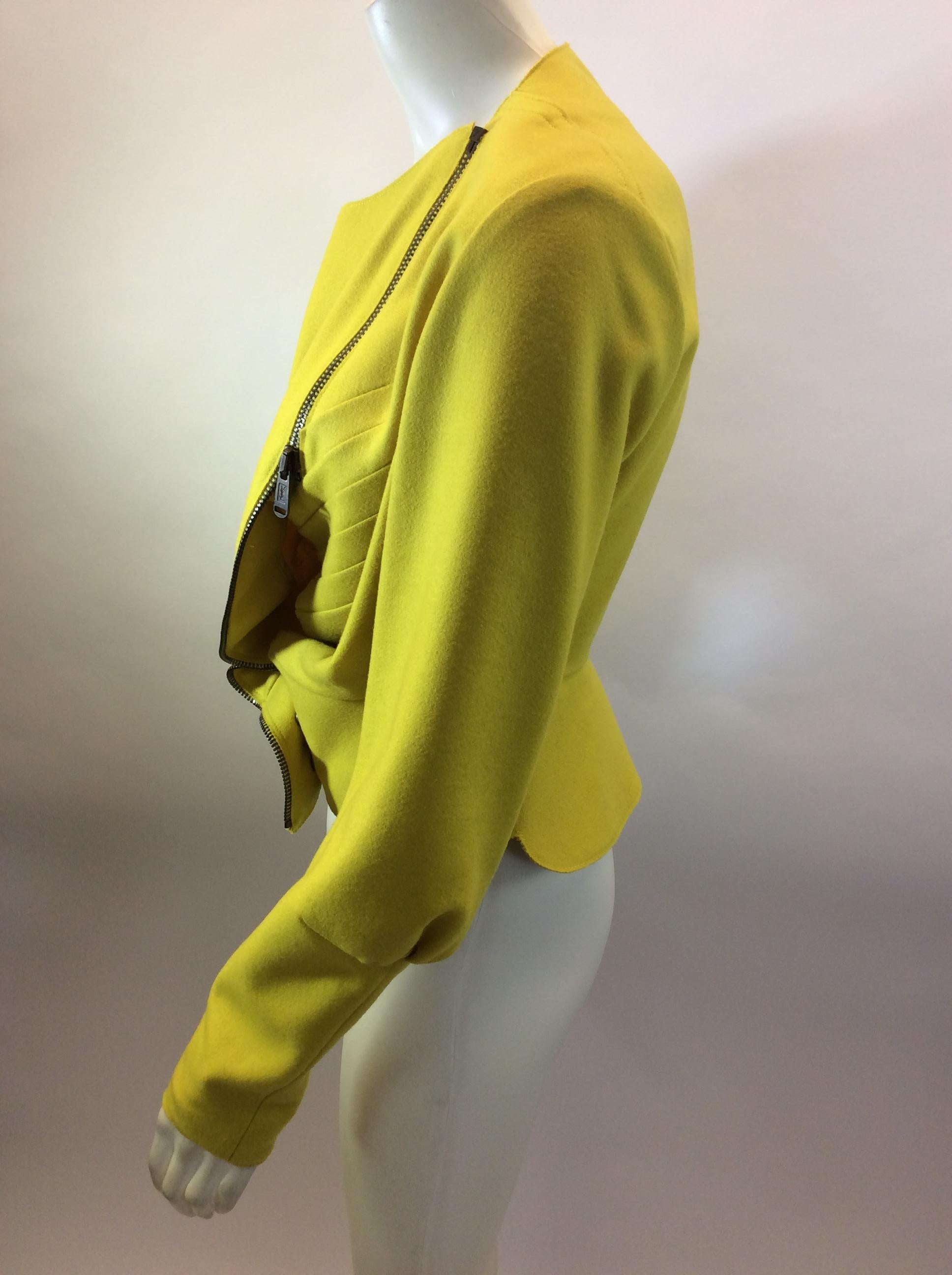 Yves Saint Laurent Yellow Wool Jacket NWT
$350
Made in France
82% Wool, 12% Angora, 6% Cashmere
Length 19