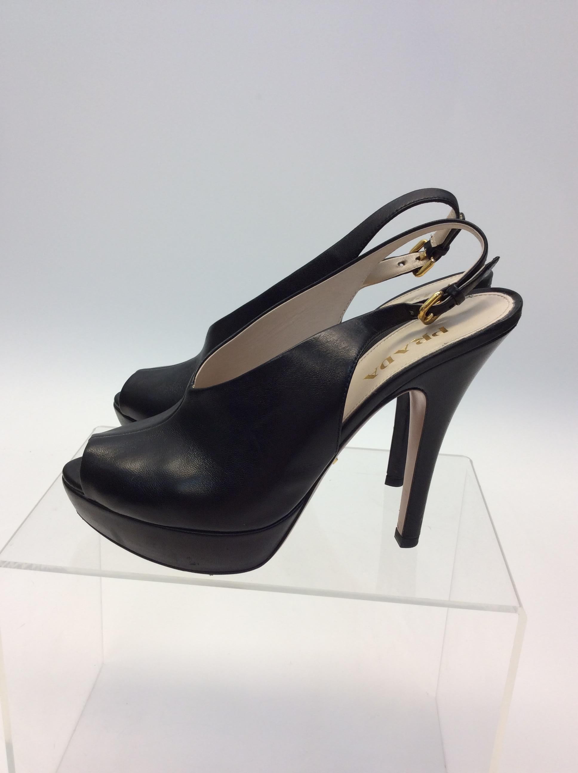 Prada Black Leather Peep Toe Heels
$199
Made in Italy
Leather
Size 38
Platform 1