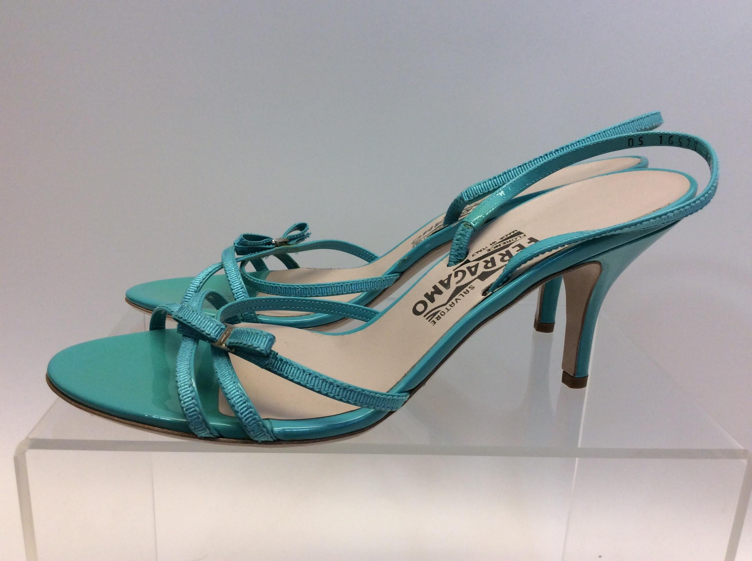 Salvatore Ferragamo Turquoise Strappy Sandal
$199
Made in Italy
Leather
Size 9
2.5