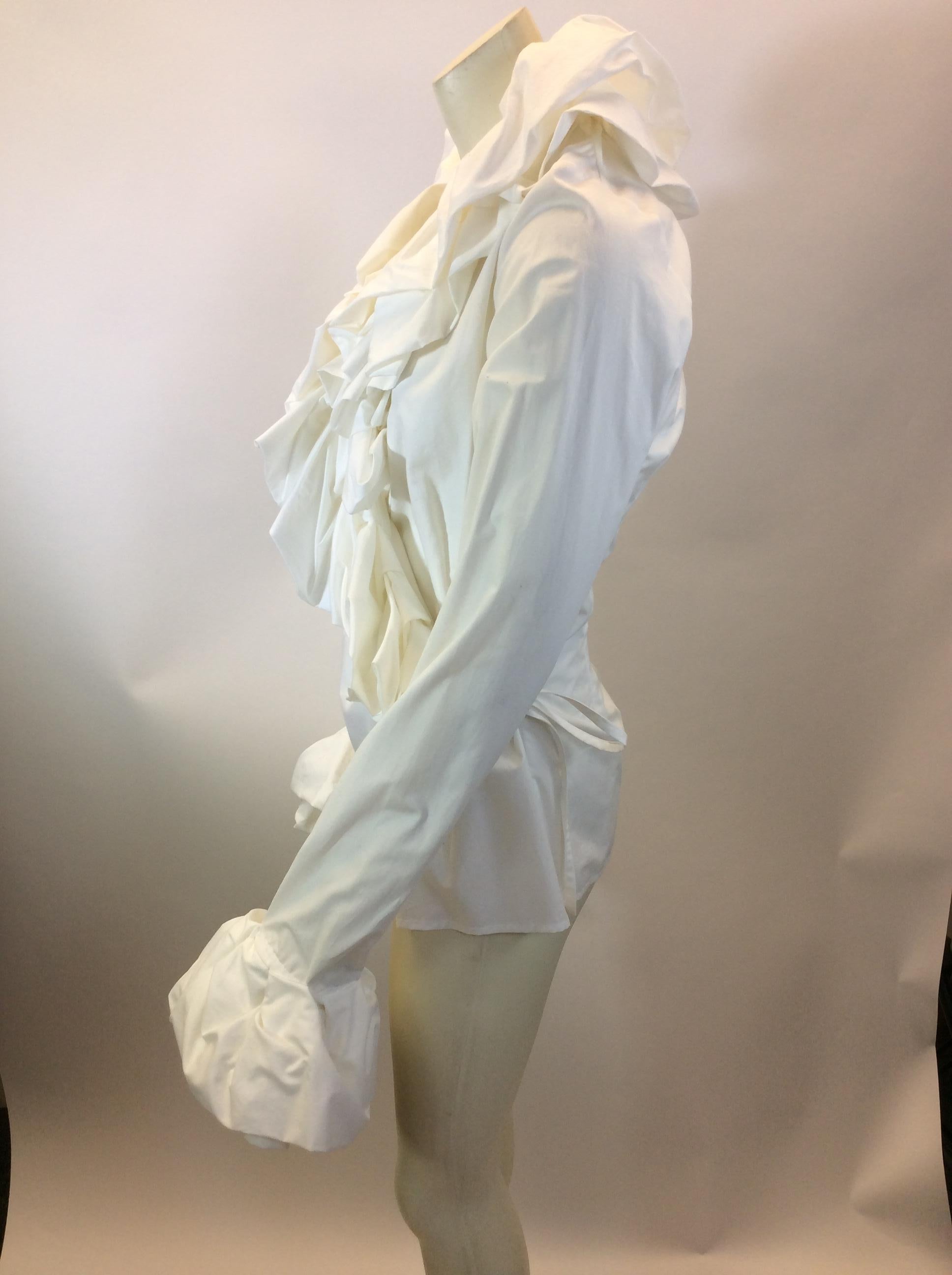 Ivan Grundahl White Ruffle Wrap Shirt
$250
Made in Portugal
100% Cotton
Size 42
Length 25