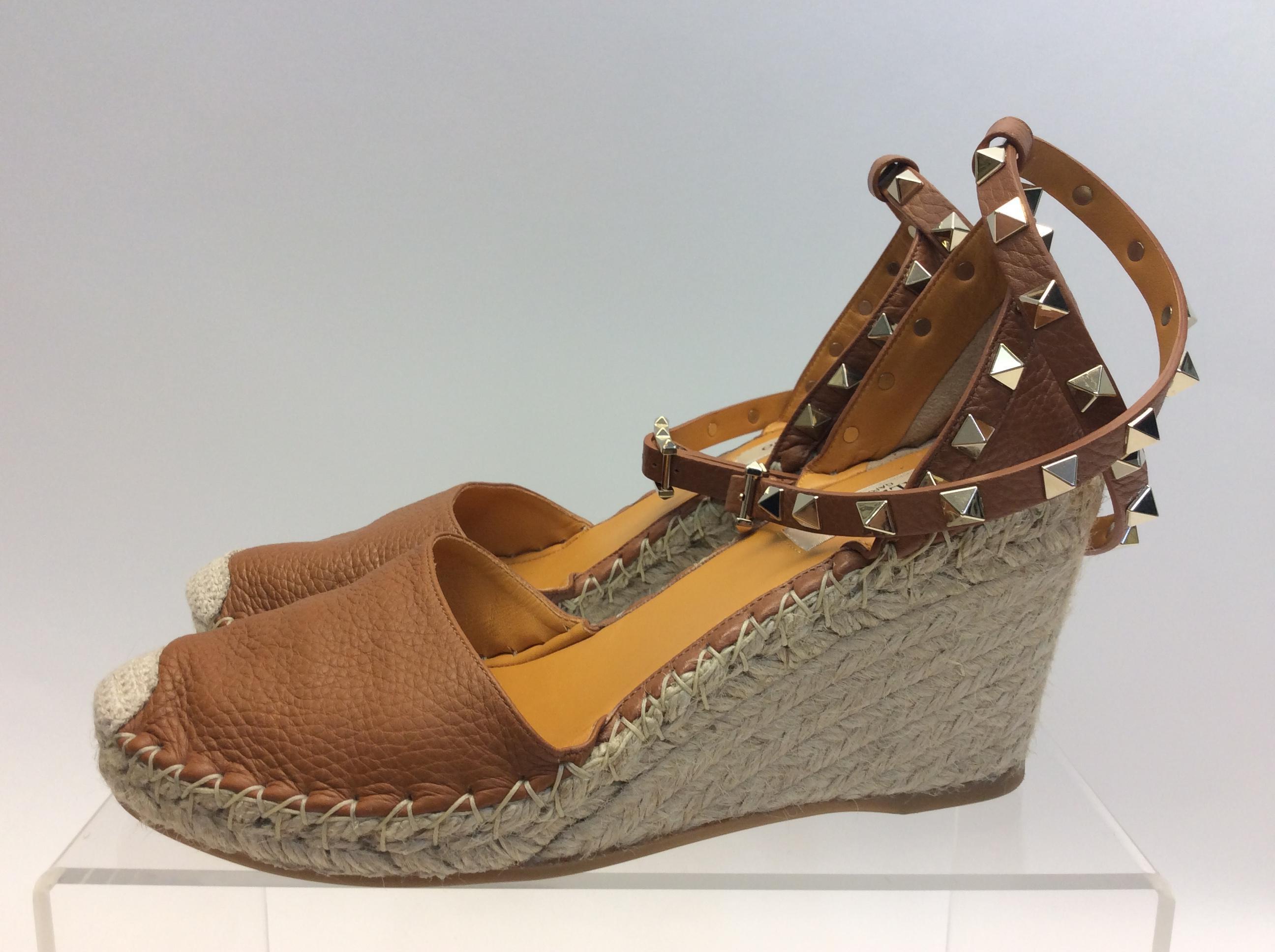 Valentino Tan Rockstud Espadrille Wedges
$450
Made in Italy
Leather
Size 38
3.5” heel
.5” platform
