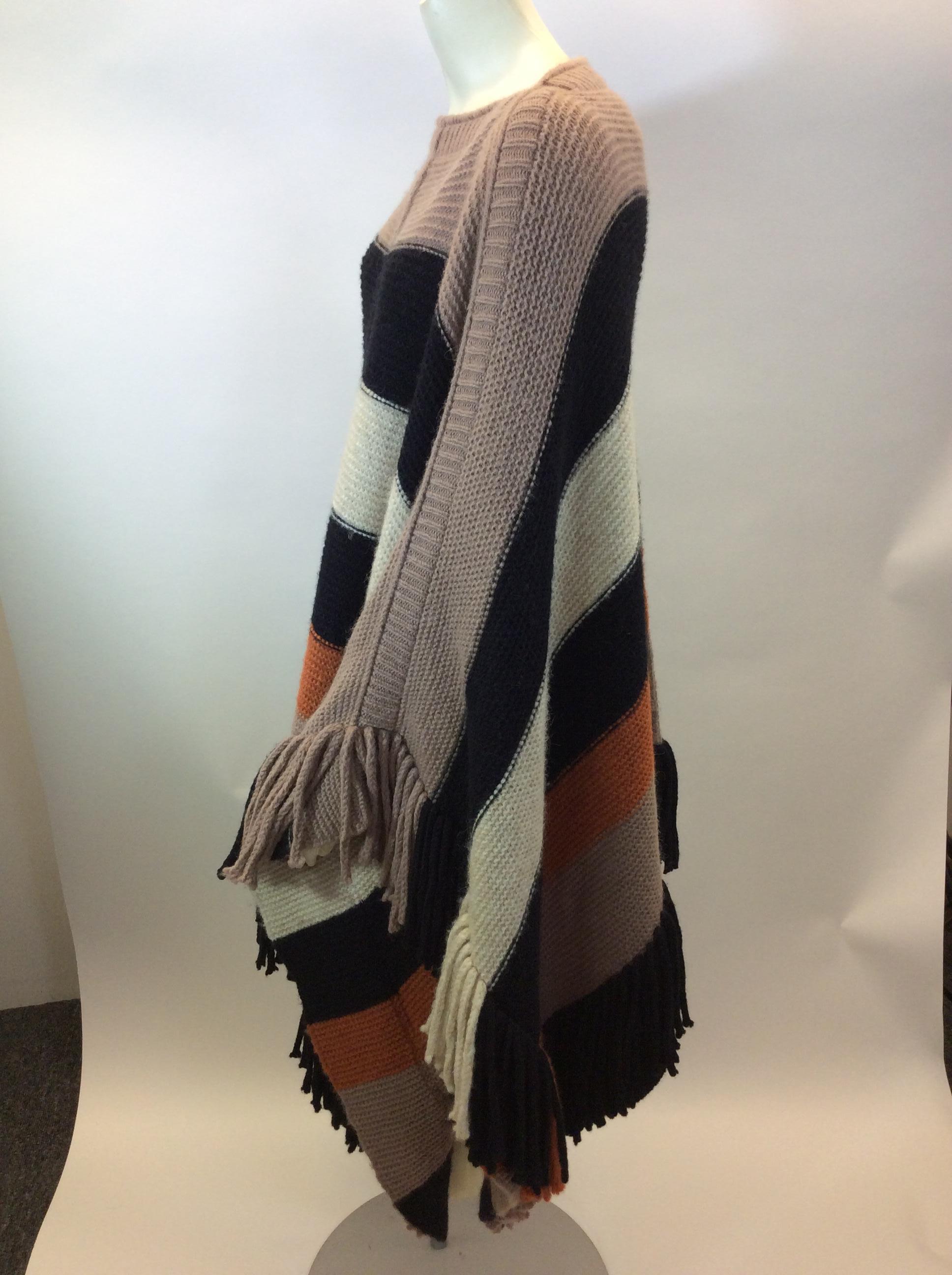 Sonia Rykiel Stripe Wool Cape
$299
Made in Italy
68* Alpaca, 10% Virgin Wool, 22% Polyamide
30” length