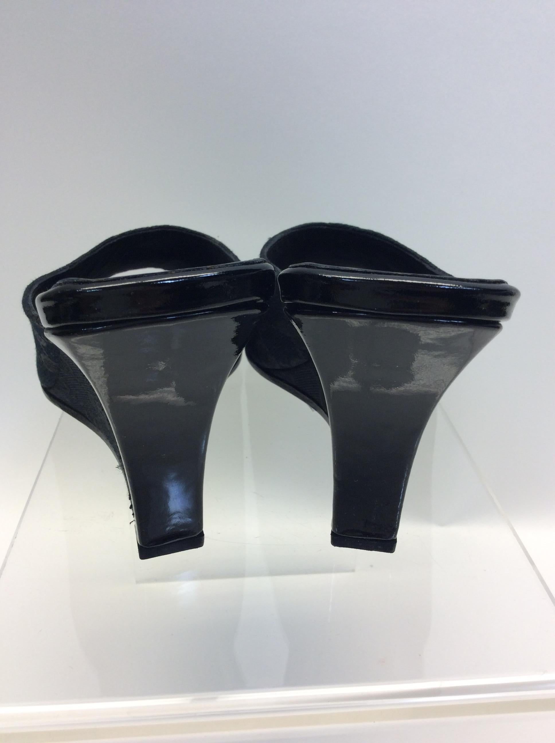 Gucci Black Monogram Slip On Wedge In Excellent Condition For Sale In Narberth, PA