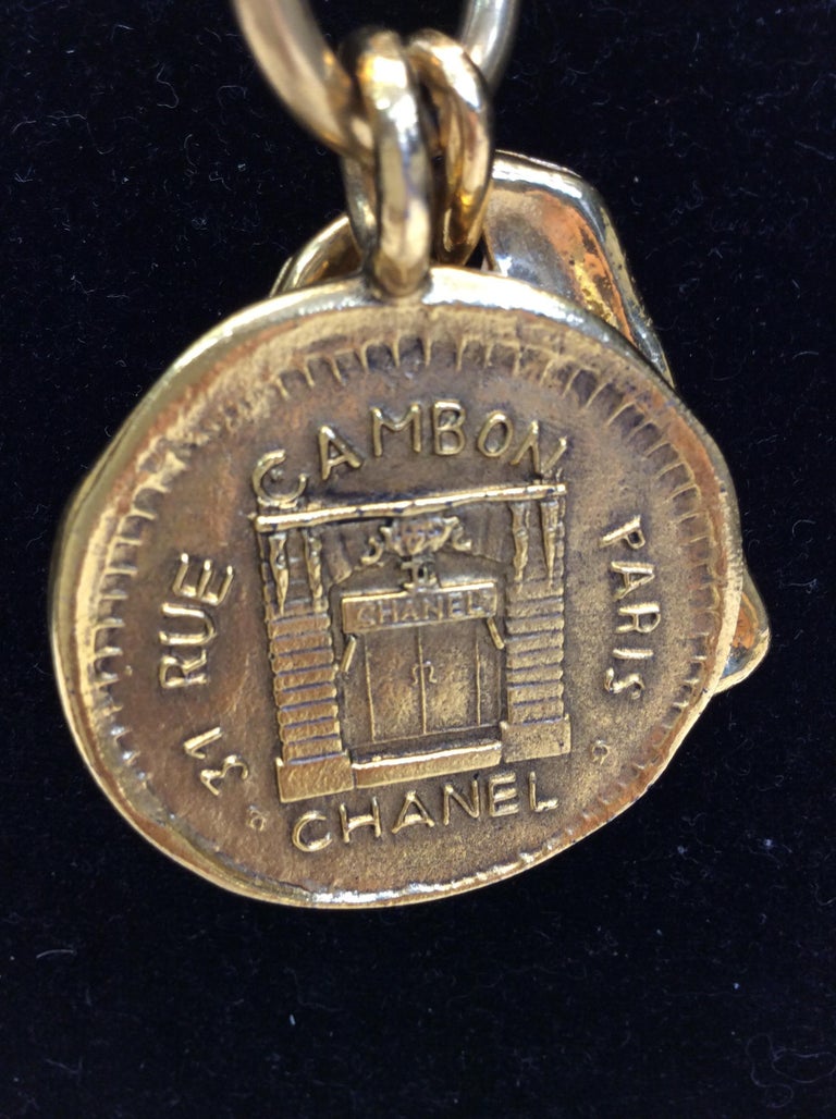 Chanel Vintage Gold Necklace with Two Charms For Sale at 1stDibs