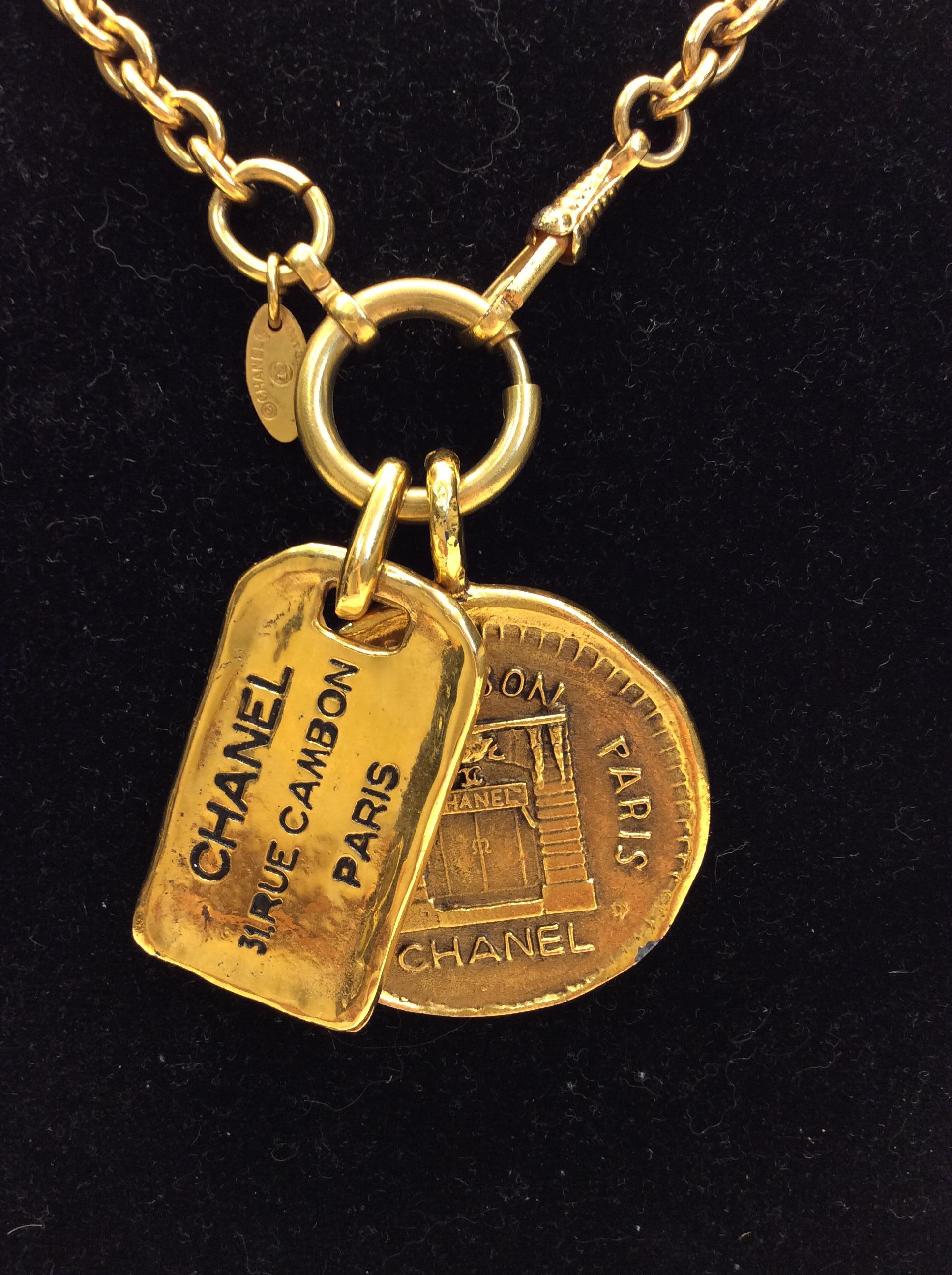 Women's Chanel Vintage Gold Necklace with Two Charms For Sale
