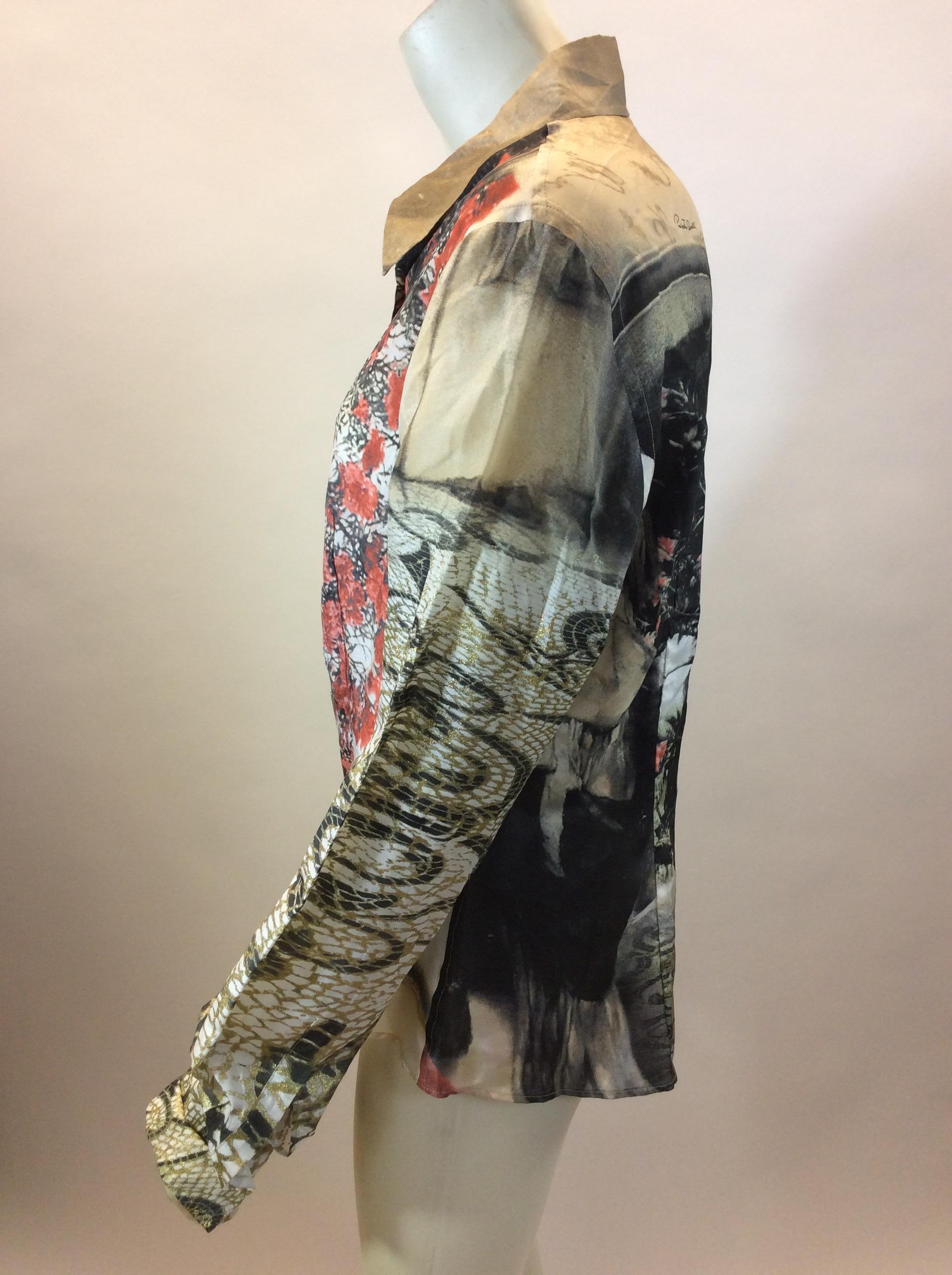 Roberto Cavalli Silk Print Blouse
$138
Made in Italy
100% Silk
Size Medium
Length 24