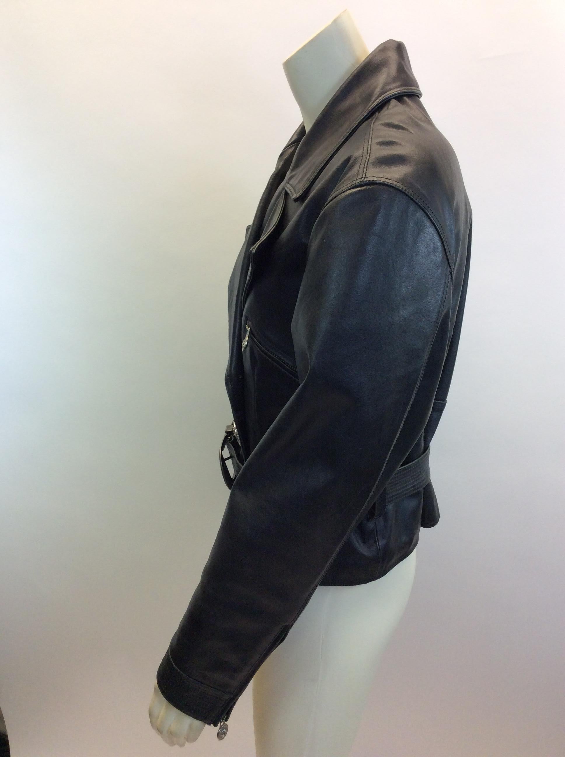 Versace Black Leather Jacket with Silver Buttons
$689
Made in Italy
Leather
Size 44
Length 21