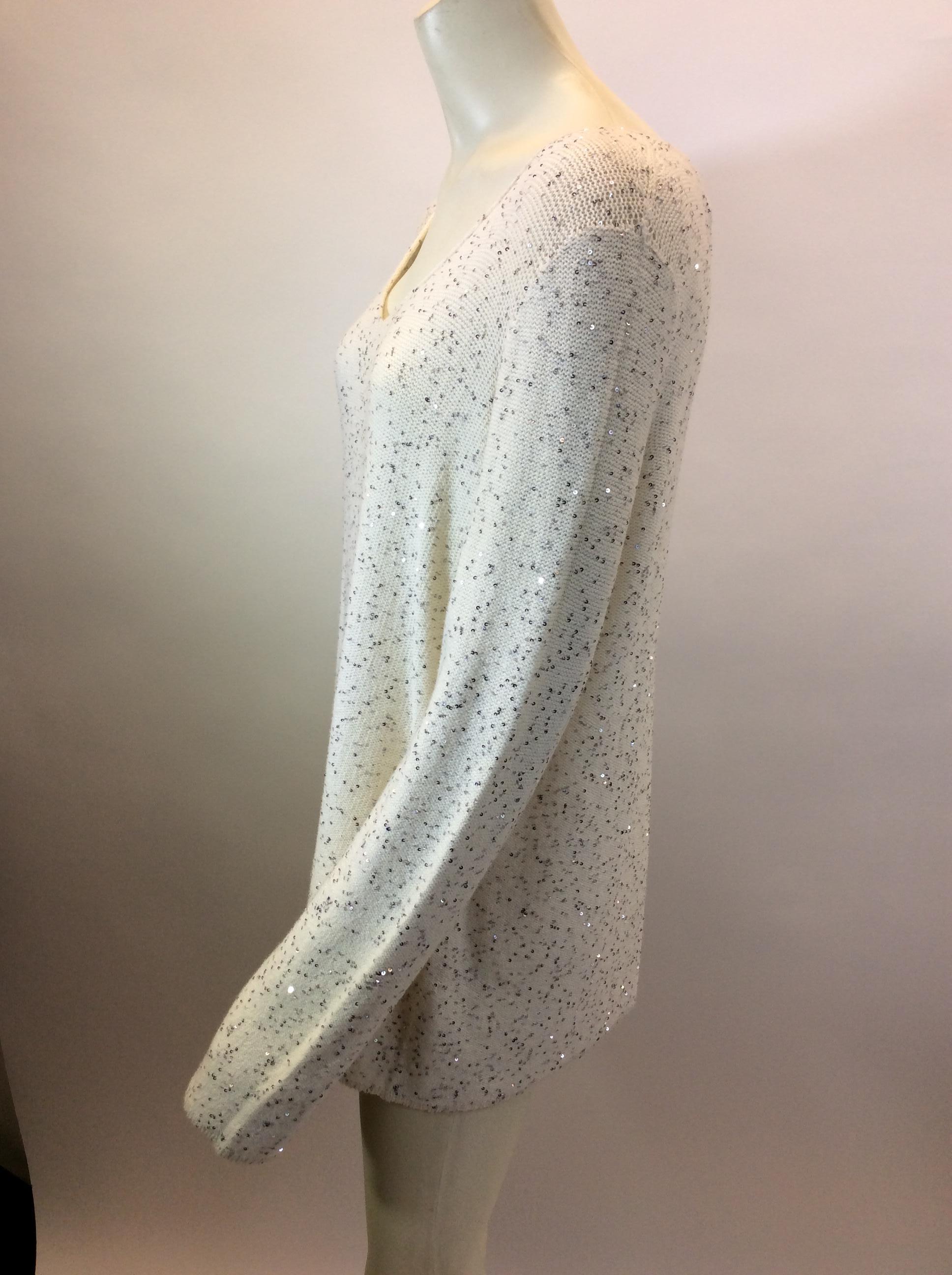 Armani White Sequin Sweater NWT
$450
Made in Italy
50% cotton, 30% polyamide, 10% cashmere, 10% polyester
Size 38
Length 26