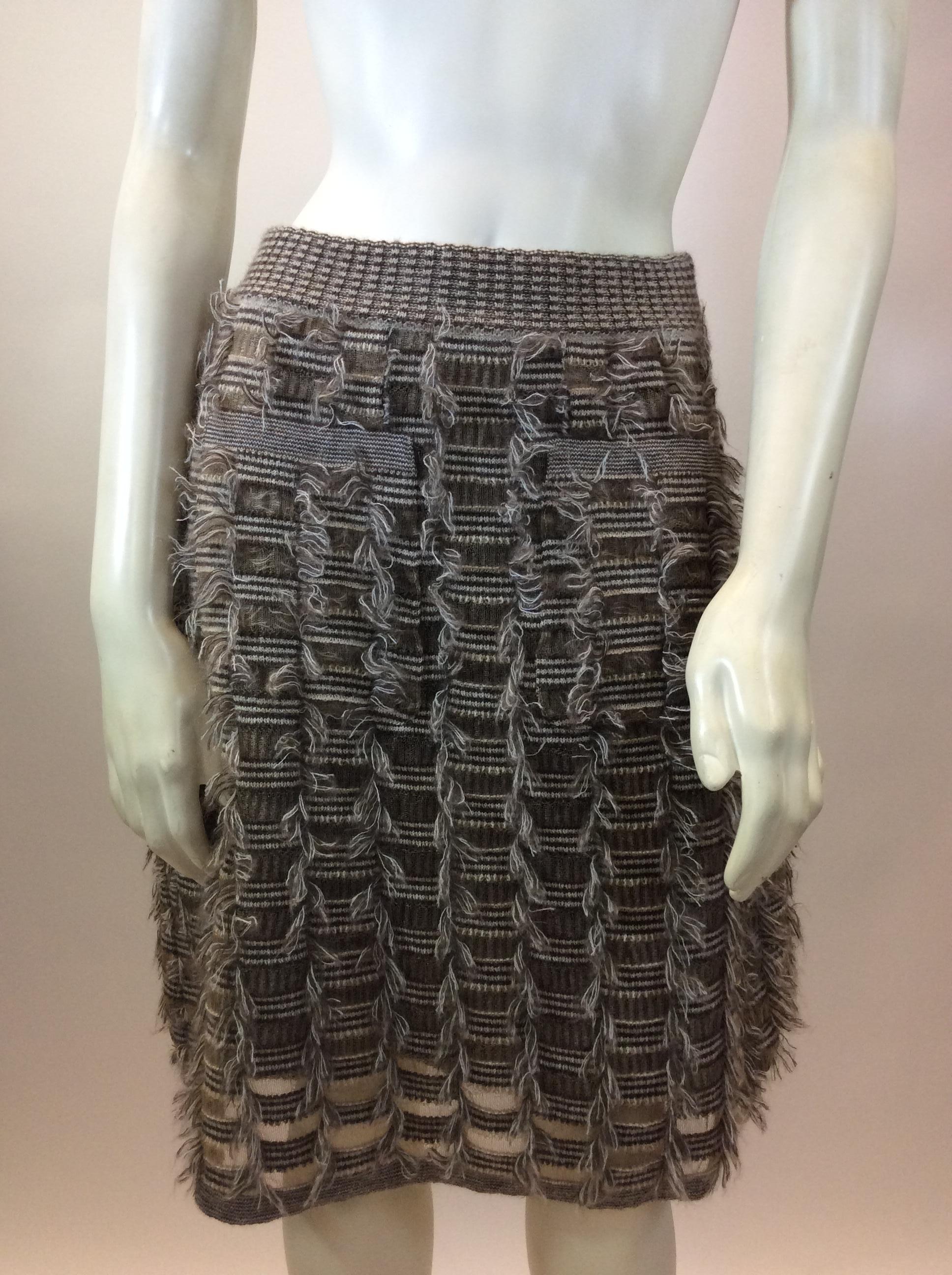 Chanel Tan Fringe Skirt NWT
$499
Made in Italy
54% mohair, 41% nylon, 5% wool
Size 34
Length 22