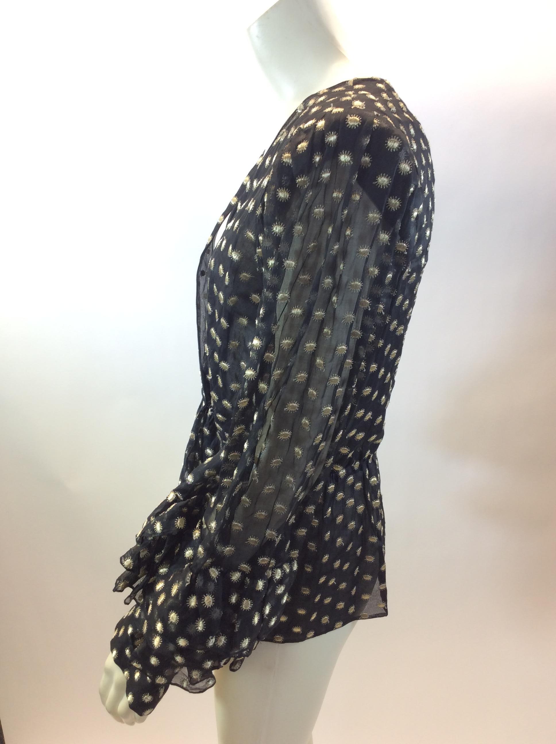 Givenchy Couture Black and Gold Print Blouse
$250
Made in France
100% Cotton
Length 24
