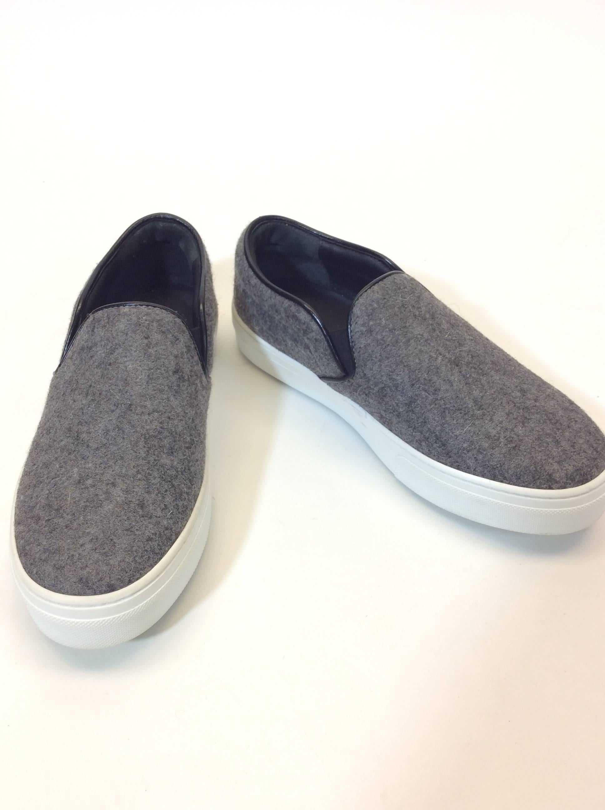 Celine A/W 16 Collection
Light Grey Felt
Slip on Sneakers with Stretch Sides
Rubber Soles
Includes Box and Dust Bag
EU Size 36
4