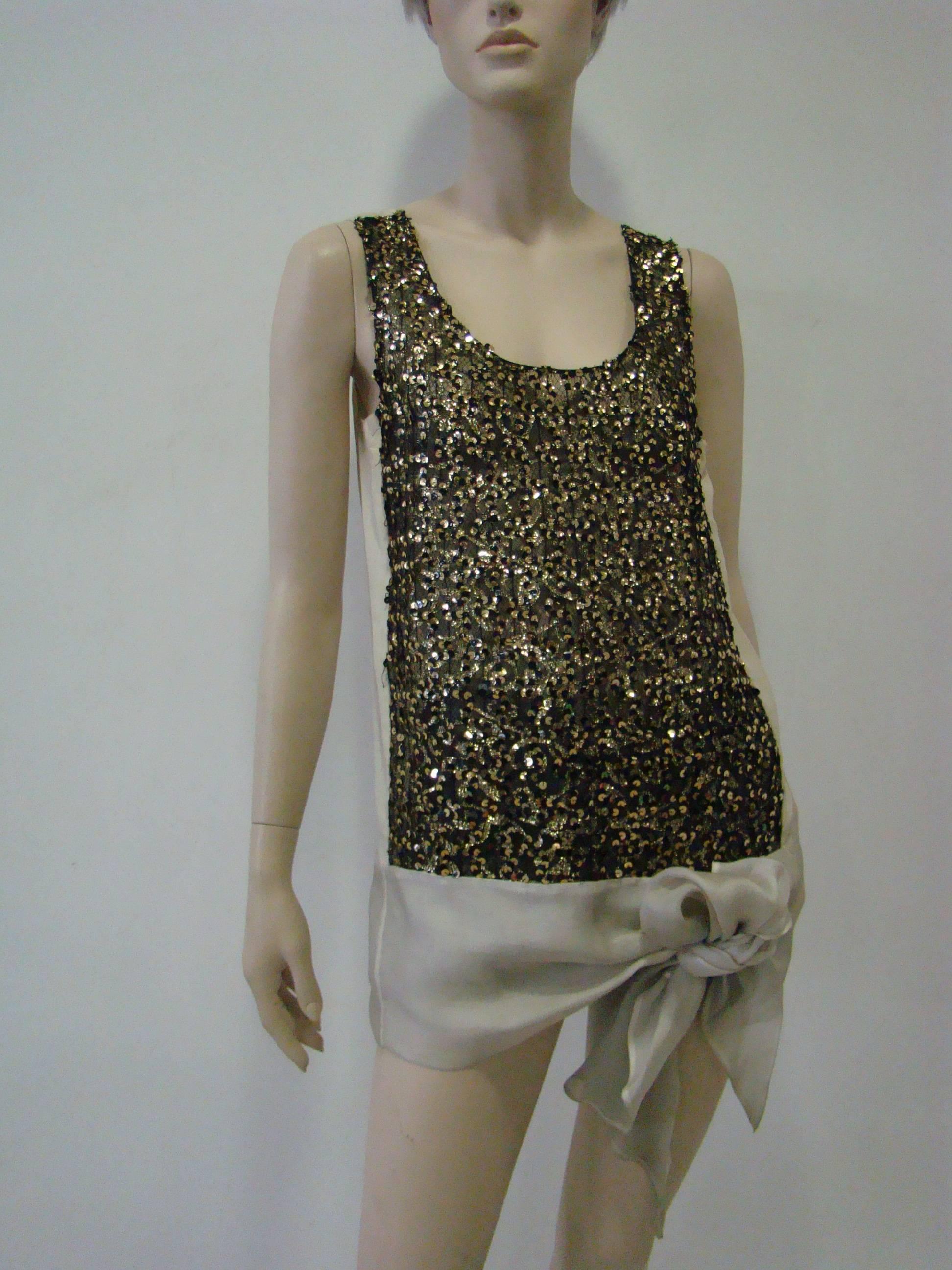 An Amazing Piece From Gianfranco Ferre 1990's. Cut From Featherweight Silk Back And A Gold Lurex Sequin Front, Featuring A Beautiful Wrap Style With A Slit To One Side. Pair This With Leggings And High Heels And Let It Shine.
