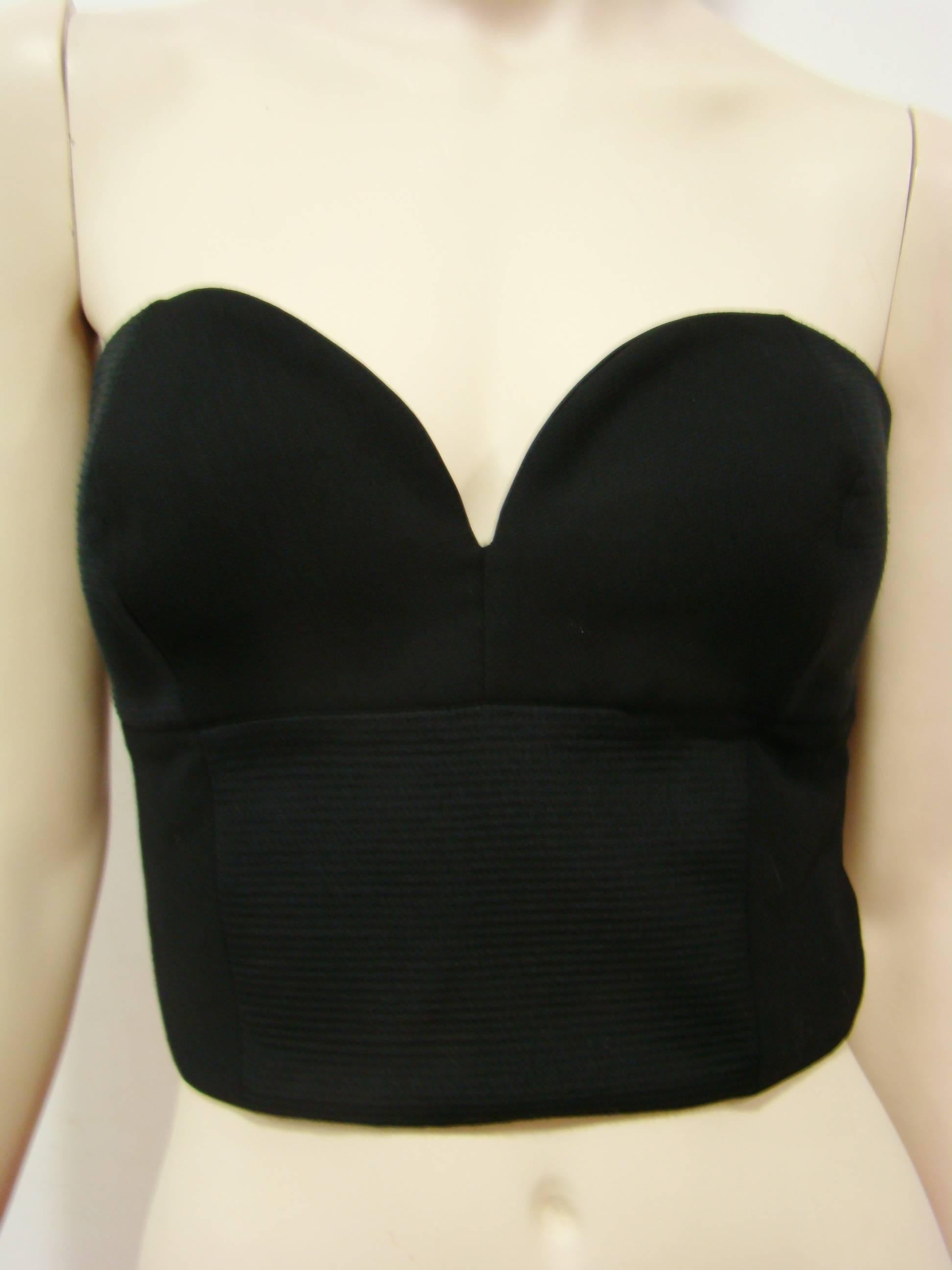 Gianni Versace Couture Black Wool Bustier Top Is An Elegant Choice For Evening Events. This Italian Crafted Piece Is Cut From The Combination Of Silk And Virgin Wool, Featuring Spagheti Straps, A Sweetheart Neckline, Concealed Hook Closure and