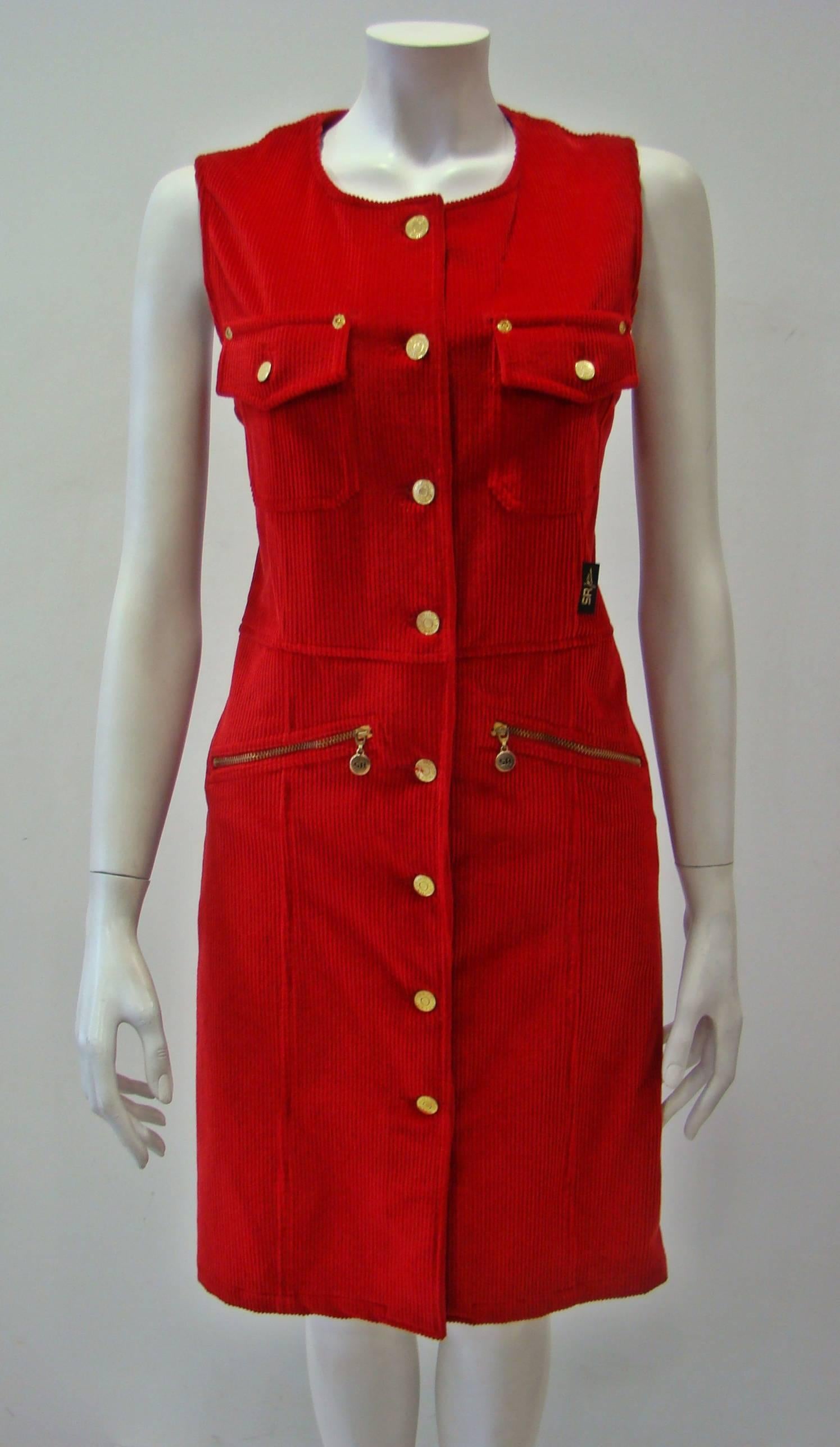 A Sleeveles Red Bengaline Dress From Sonia Rykiel Featuring Gold Buttoning Front, Two Small Front Zip Pockets And A Button Pocket At Back. Above Knee Length, Unlined. A Simple And Beautiful Dress Which Is An Easy Choice For Everywhere.
