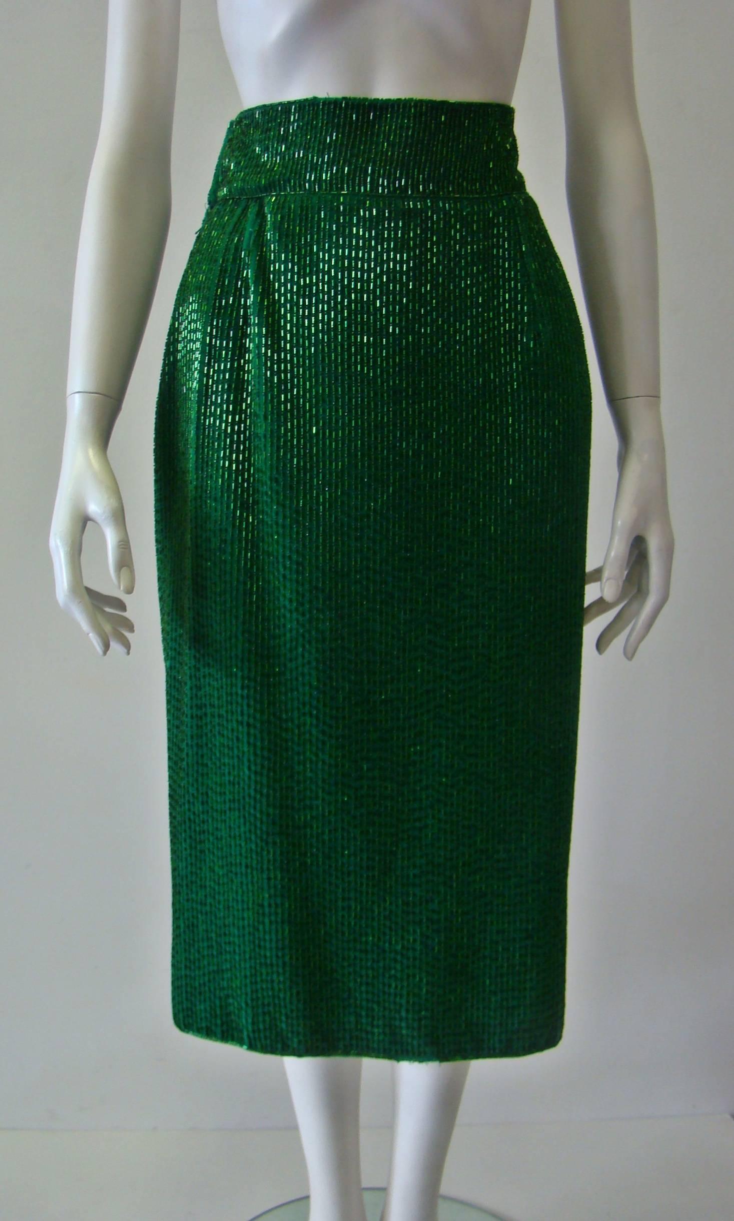 A Beautiful Green Colour Skirt From Gianni Versace. Hand Made, Beaded Skirt Featuring A High Waist, Mid Length, Zip Fastening At Side And Hook Closure At Waist. Amazing Choice For Evening Going Outs.