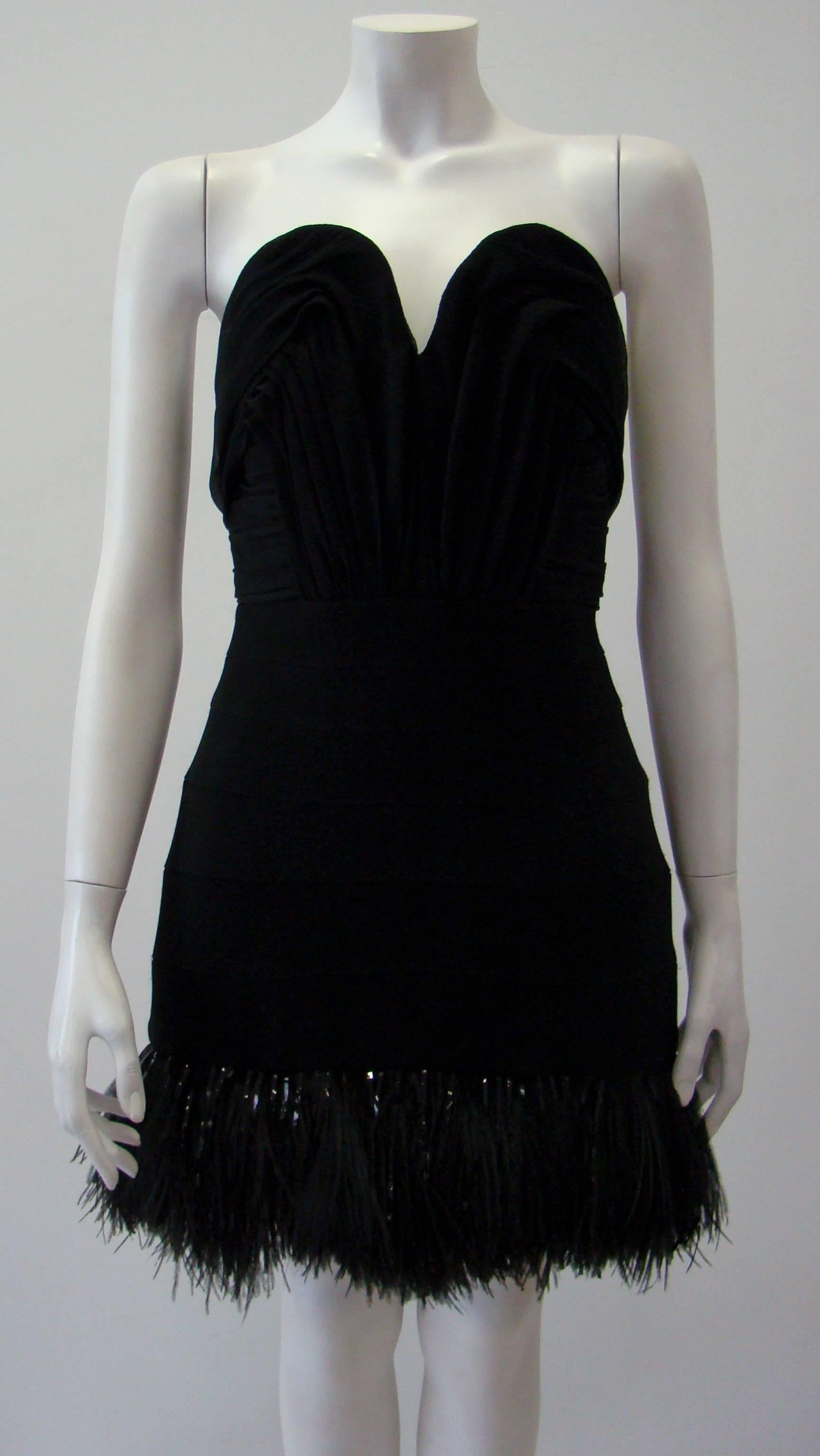 Stunning, Classy, Elegant And Timeless This Pierre Balmain Cocktail Dress Features A Deep Sweetheart Neckline, And The Front Bust Is Doubled To Really Shape And Hold Your Ladies In. With Feather Detail Around The End Line, And A Silver Visible Back