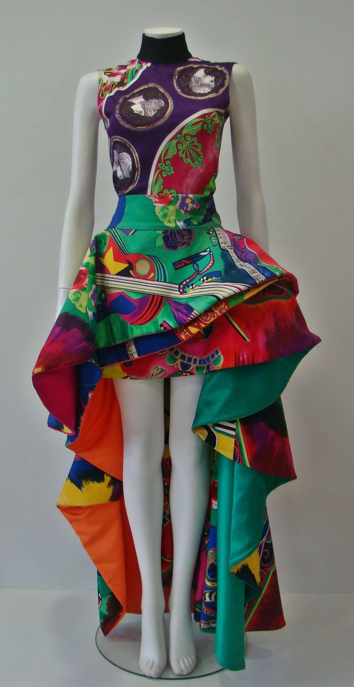 Museum Quality Atelier Versace Multi-Coloured Silk Faille Pop Art Printed Mini Ball Gown Skirt.  From the Spring 1991 Atelier collection shown at the Ritz in Paris.  The skirt features a mini hem in front with a long tiered back bustle panel on a