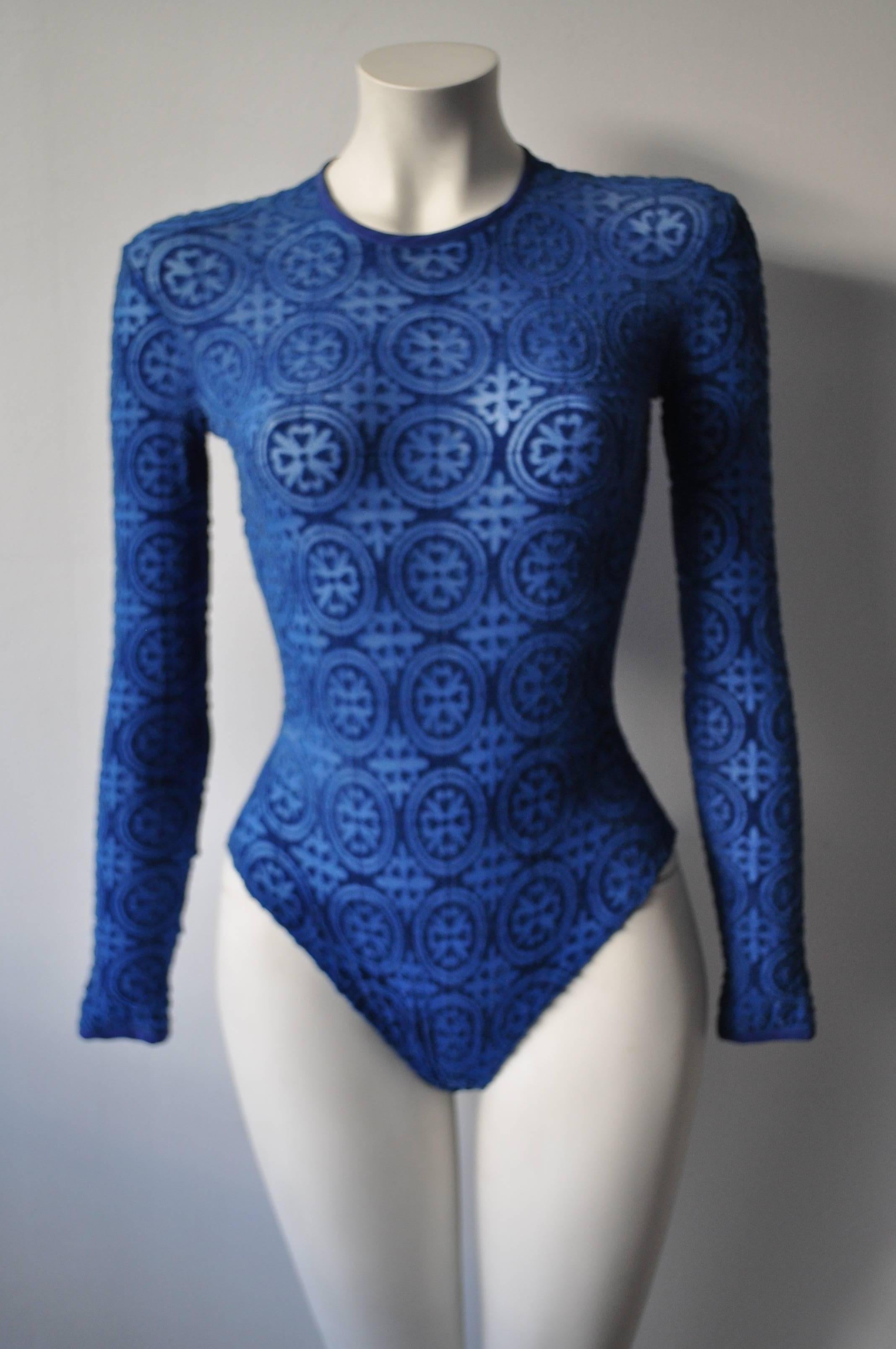 Gianni Versace Blue Coupe des Velours Body Suit Punk Collection Spring 1994 The collection was a combination of hippie, punk, and grunge influence that was youthful, upbeat and innovative. A high profile show biz extravaganza. A haute perspective on