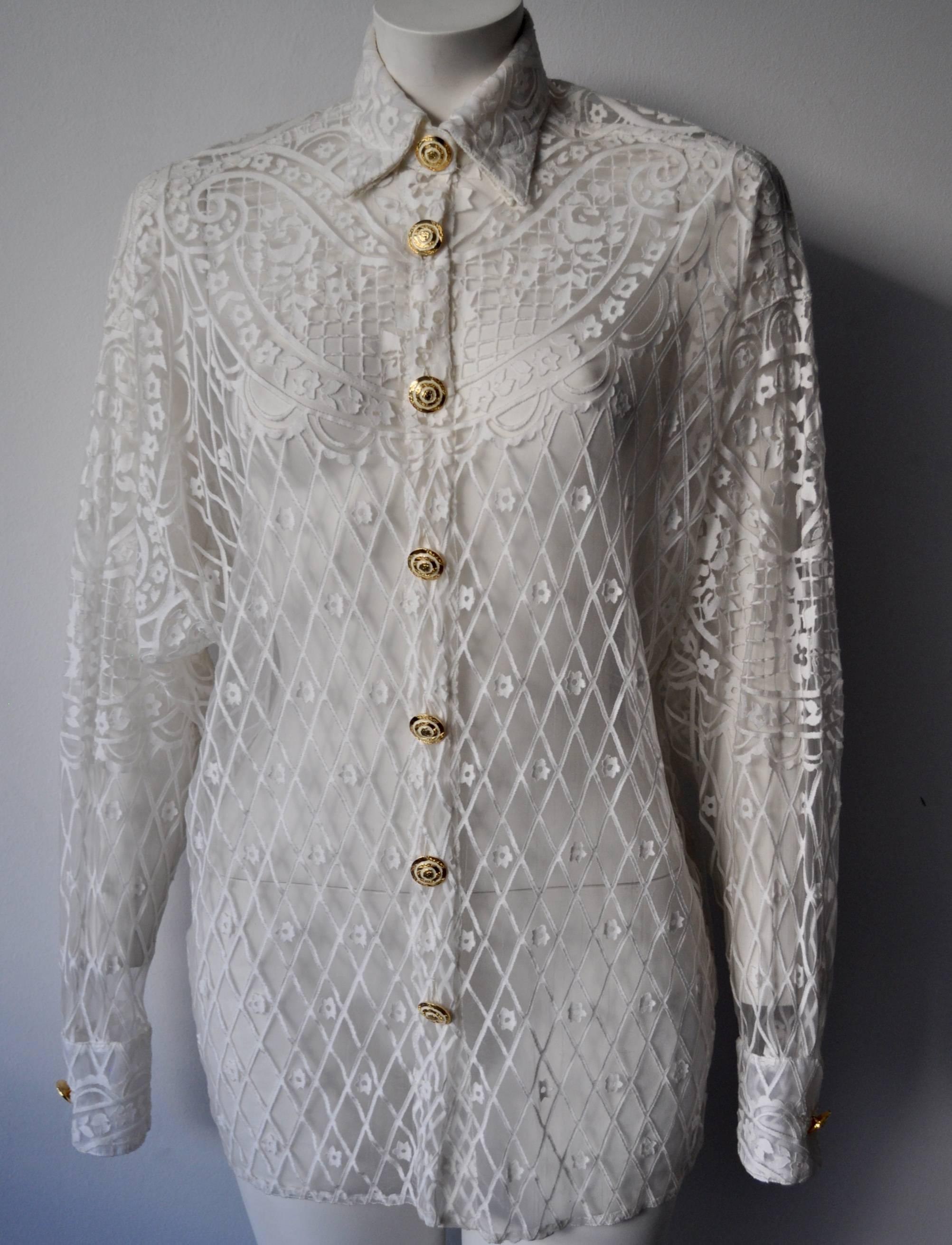 Eclectic Gianni Versace Couture Laser-Cut Sheer White Silk Shirt featuring prominent Gold gilt metal and white paste buttons from the provocative 
Punk Collection, Spring 1994.