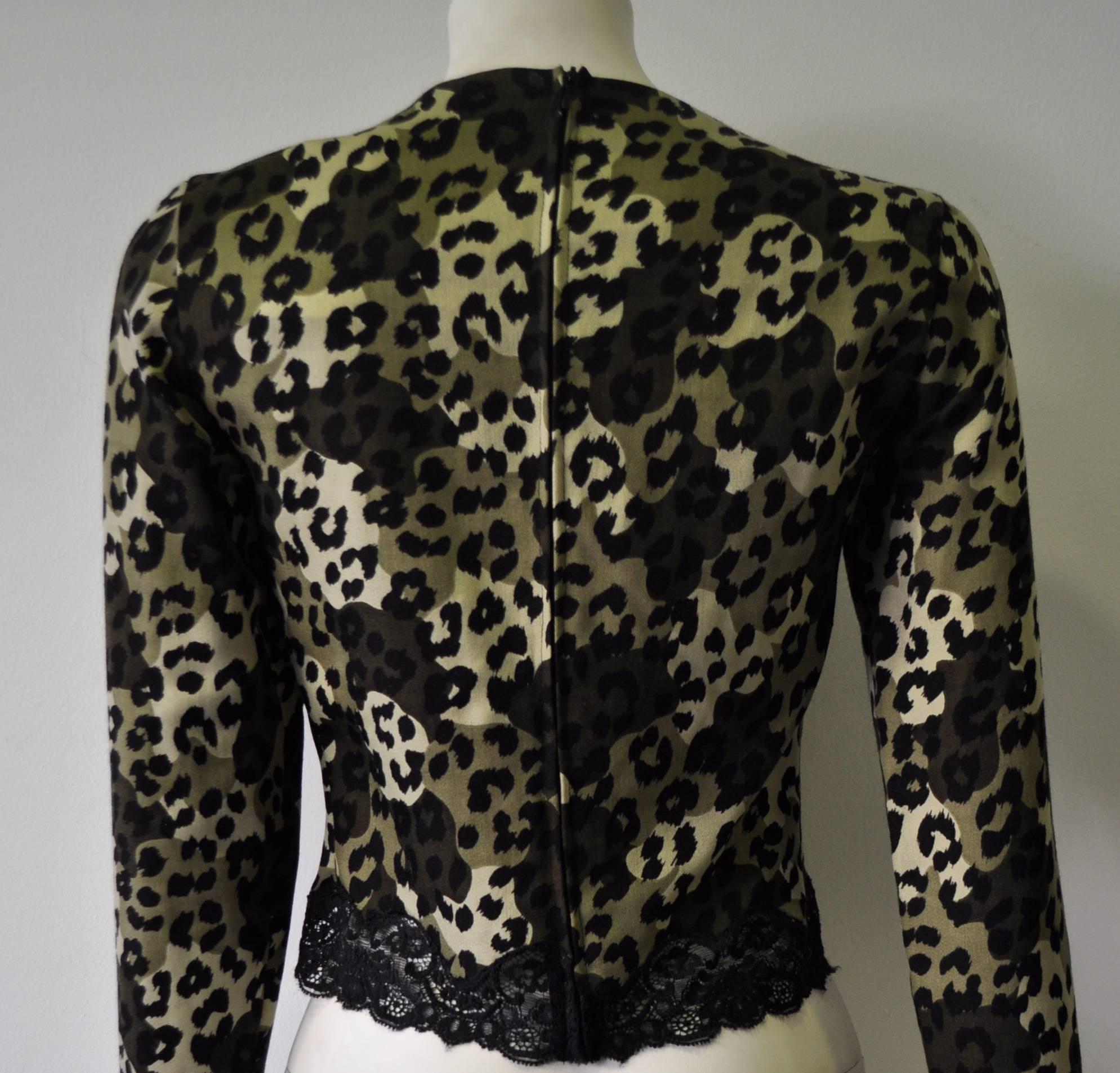 Rare and interesting Gianni Versace 100% Wool Leopard Camouflage Printed Top with lace trim and refined zipper sleeve detail.