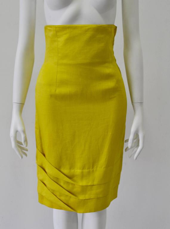 Adorable high waisted skirt with blue yellow and tan designs. Fully lined. Front pockets. % Cotton. In EUC normal fading and wear.