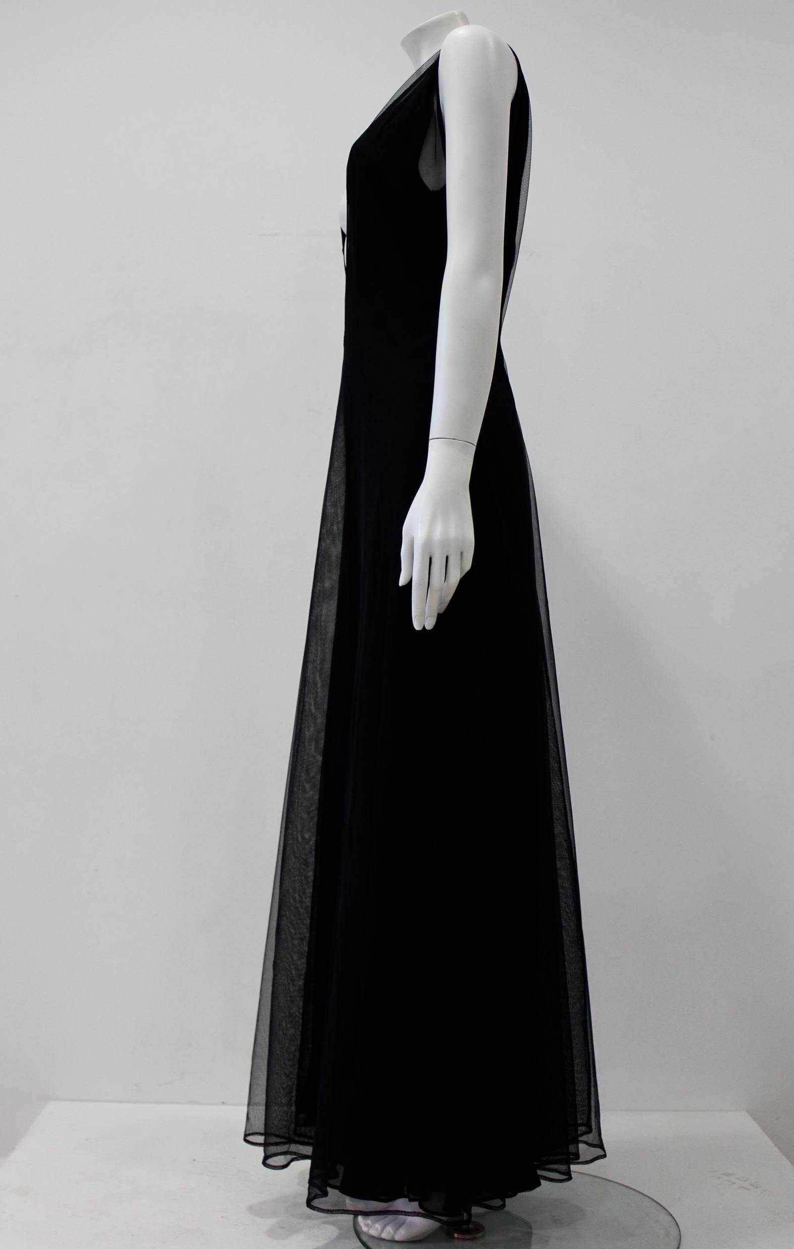 Early Tom Ford For Gucci Black Silk And Tule Elegant Maxi Dress 1998's. A Three Layered Silk Georgette And Tule Dress With An Emphasised V-Neck Front And Back Which Oozes Charm And Elegance.