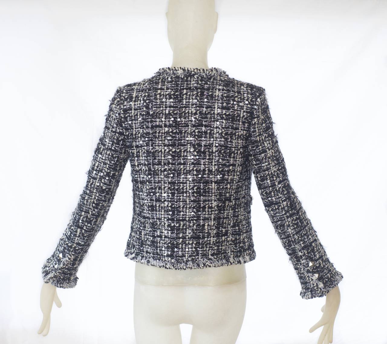 Chanel Black and White Tweed Jacket with Tiny Sequins and Camellia In Excellent Condition In New York, NY