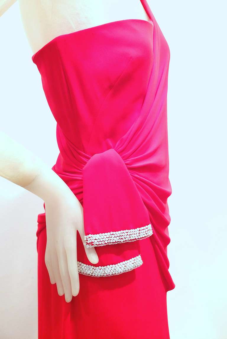 A wonderfully glamorous and beautiful one shoulder gown in Valentino's signature 