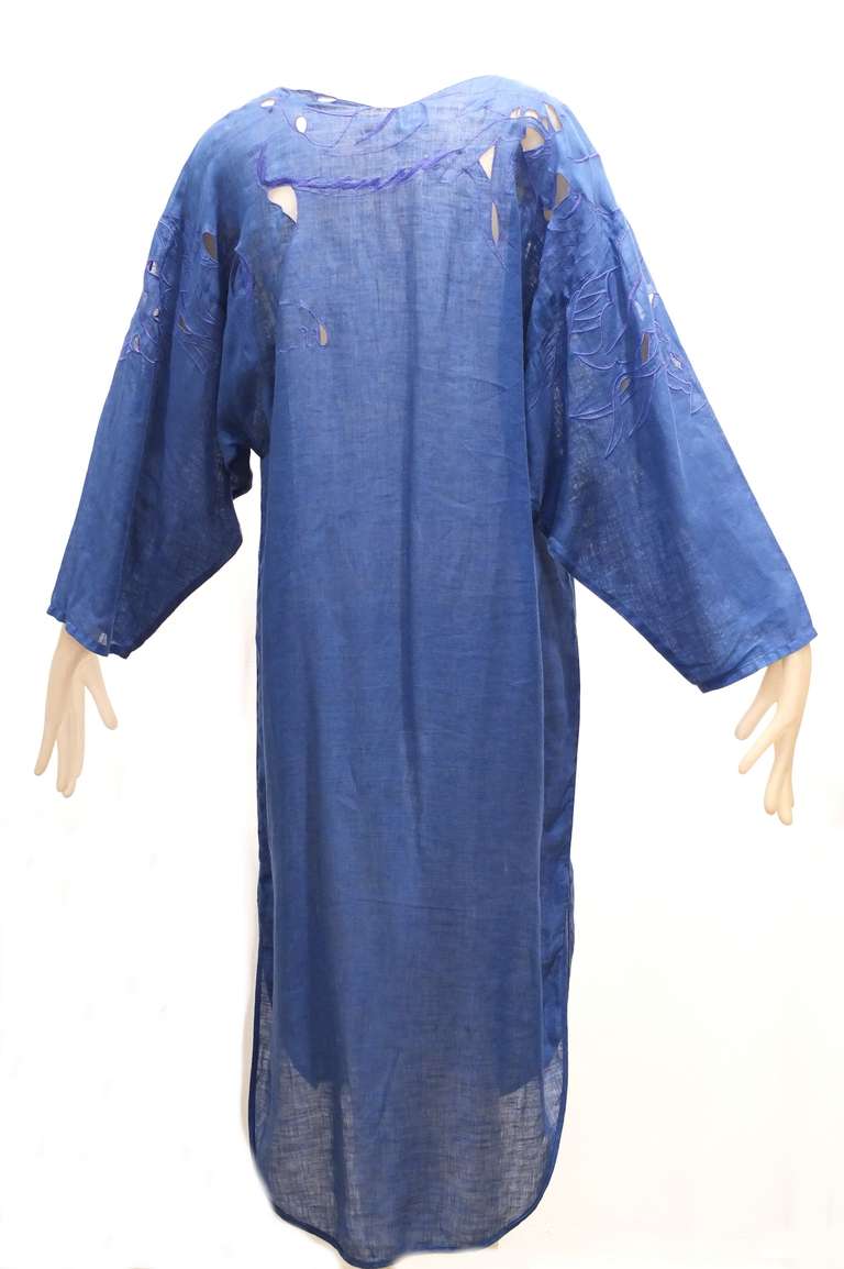 A very amazing blue linen Krizia caftan with a panther cleverly cut into and  embroidered onto the caftan.  Perfect for summer days and nights.