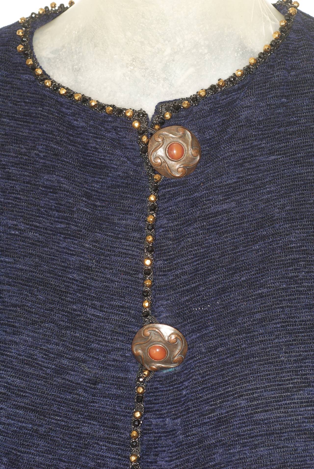 Provenance Nan Kempner.  A beautiful Ungaro haute couture beaded cardigan /jacket in a soft deep marine blue with beading.  Fringed tassels are interspersed with beading.  Bronze buttons.  Please note this piece is unlabeled.  This was purchased