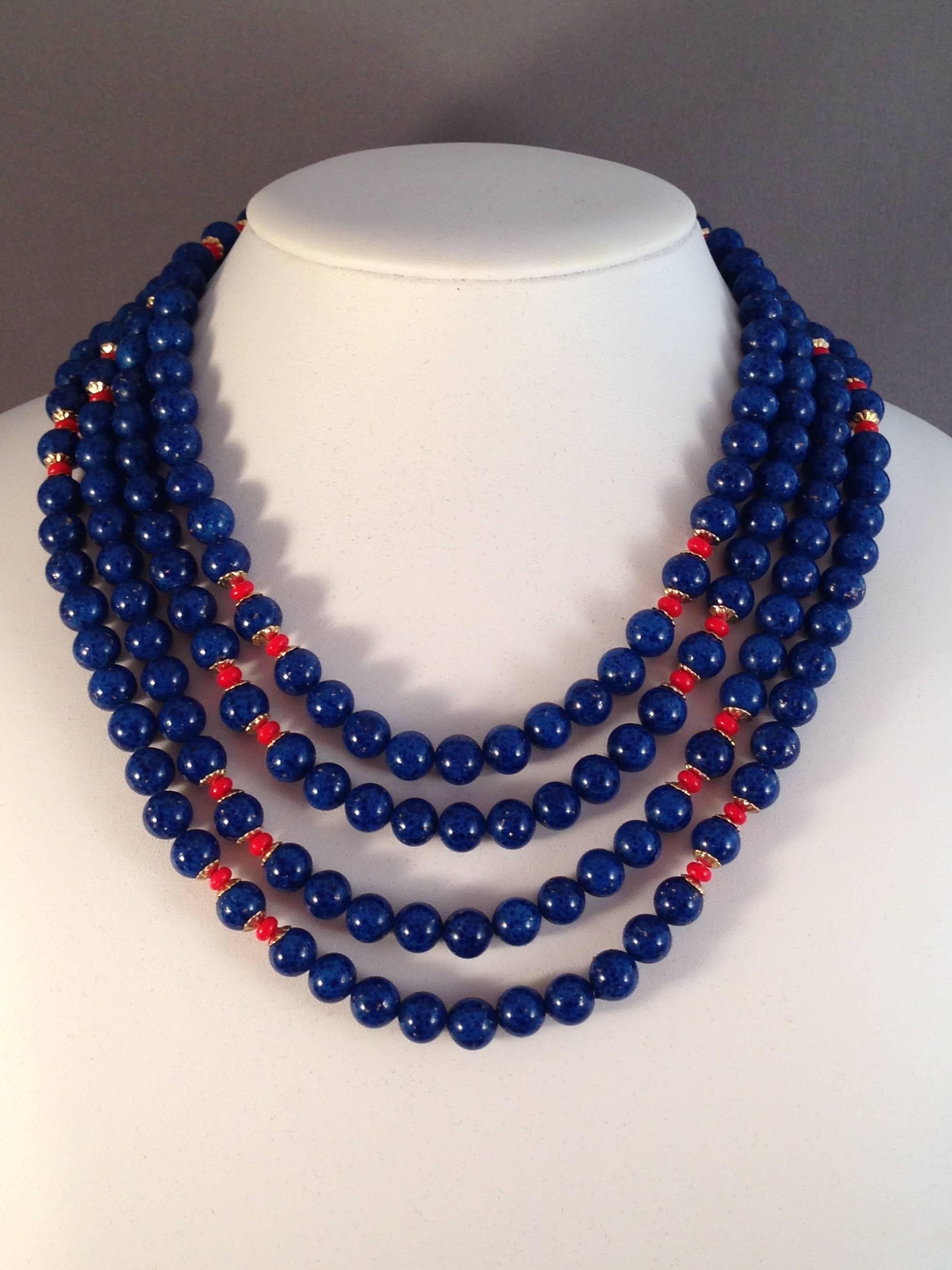 Rare and beautiful, blue and red 1971 glass William de Lillo necklace from the William de Lillo archives of samples and prototypes. This necklace is part of a set that includes a matching necklace and brooch which I have also listed on 1stdibs.  The