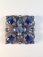 Schiaparelli Brooch and Earrings 1940s Silvertone and Blue Stones