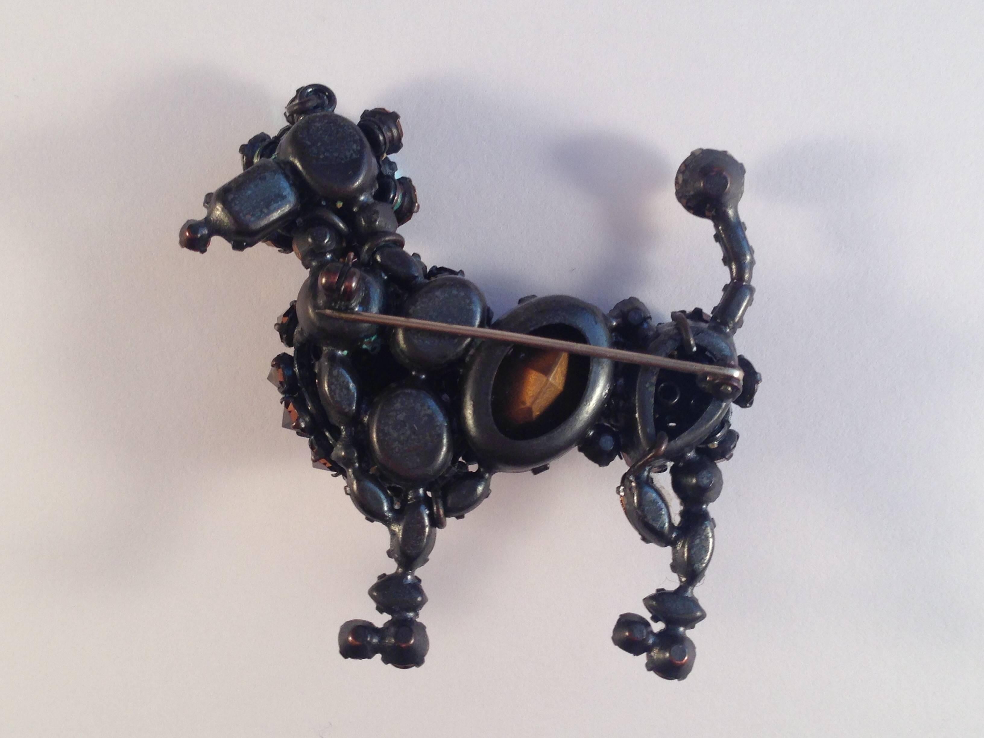 unsigned schreiner brooch