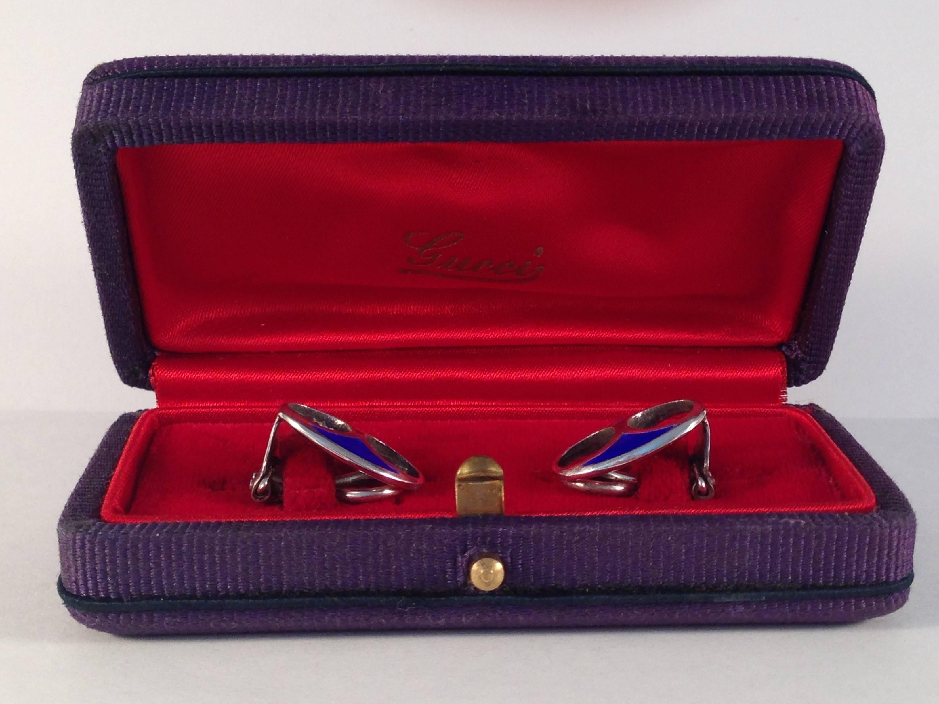 Beautiful 1970s sterling and blue enamel clip on earrings. The earrings measure 5/8