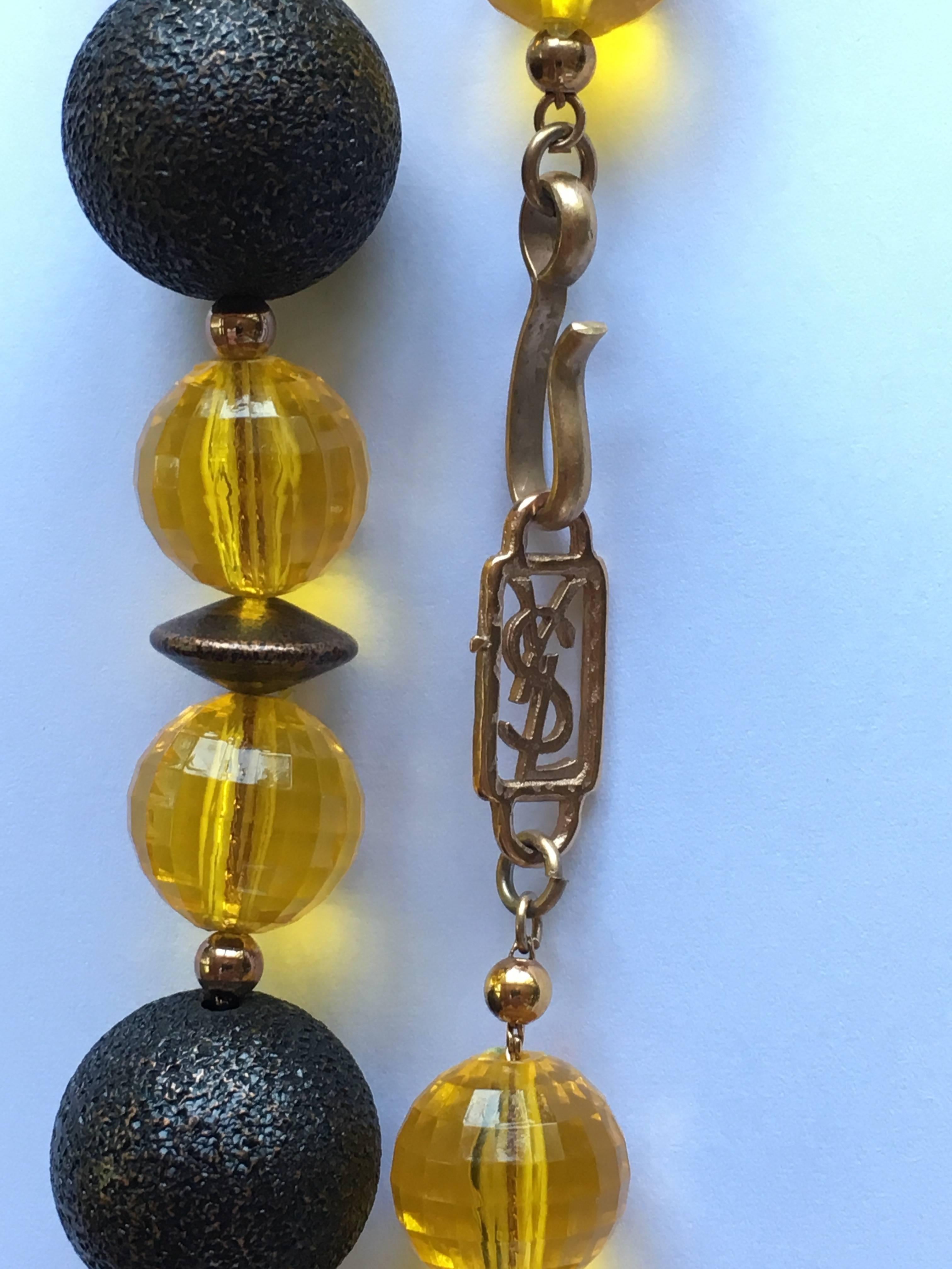 1970s Yves Saint Laurent Long Yellow and Copper Beaded Necklace In Excellent Condition For Sale In Chicago, IL