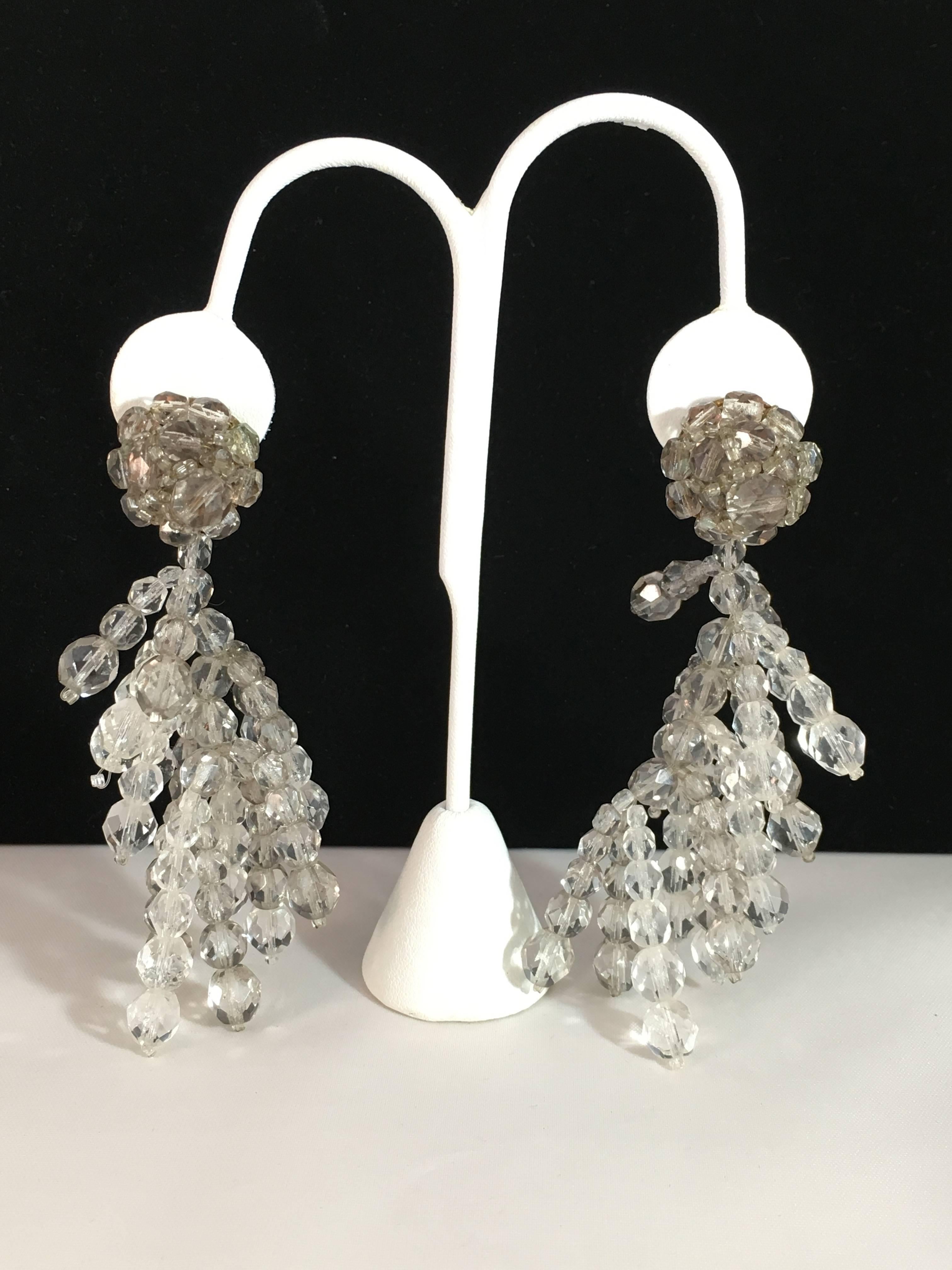 A beautiful pair of 1950s clip-on crystal earrings by the Italian company, Coppola e Toppo.  They measure 4" long and 1 1/2" at their widest point. They are signed on the back, 'Made in Italy by Coppola e Toppo'. They are in excellent