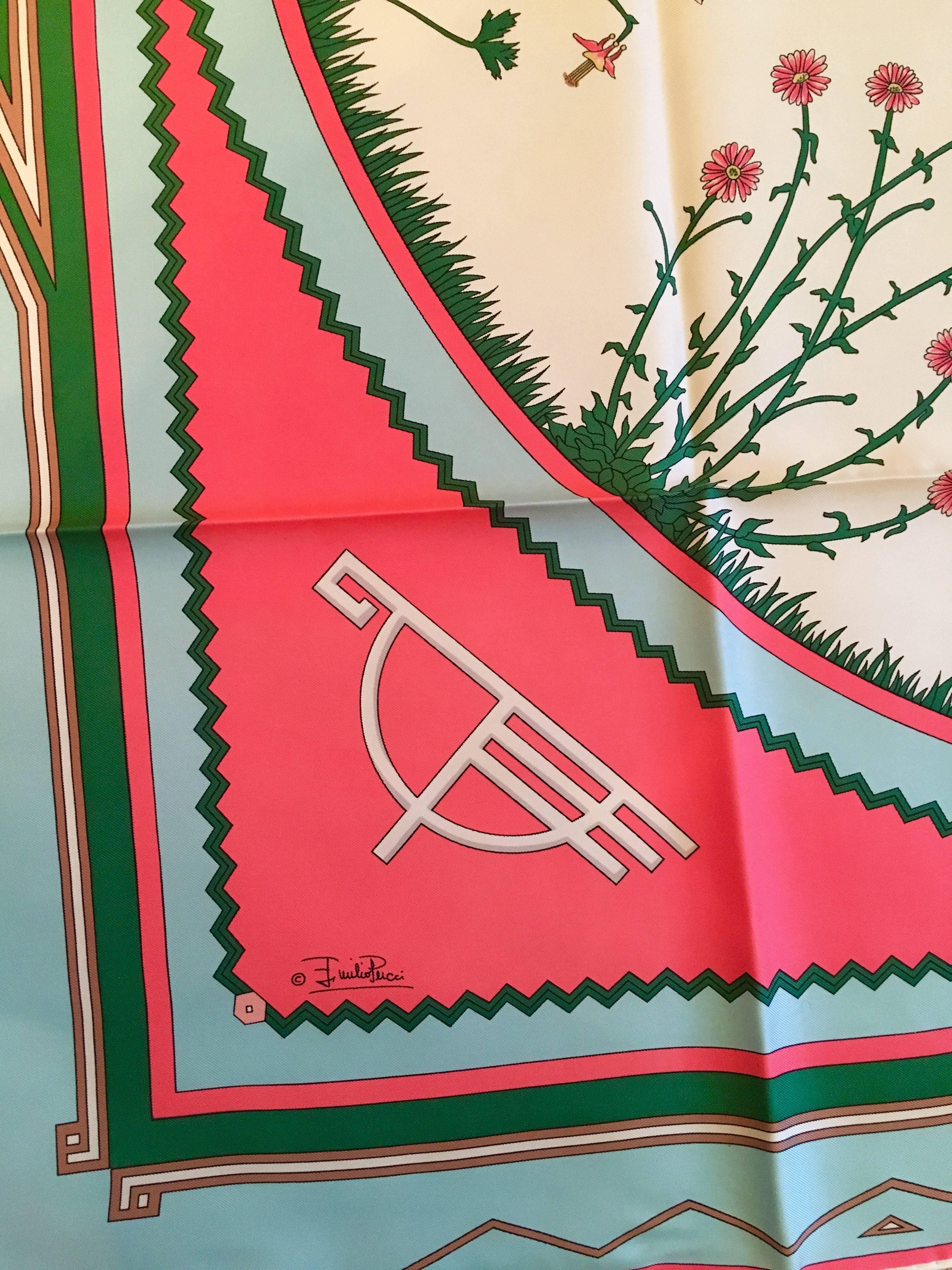 This is a beautiful very rare Emilio Pucci scarf made in 1987 for the 50th anniversary of the Timberline Lodge in Oregon. It is in its original packaging and is in like-new condition. The scarf features a picture of Timberline Lodge in the center