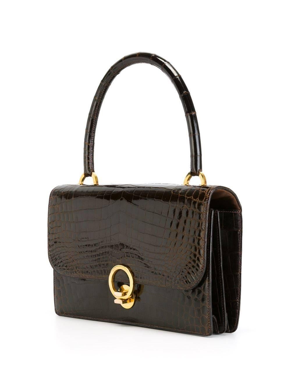 Fabulous Hermes Ring handbag of the 50s. Exceptional brown porosus crocodile leather. Brown will be the new black in 2017. Just to love & cherish!  The french elegance. a Rarity in excellent condition. Delivered with Cites Document (5-10 opening