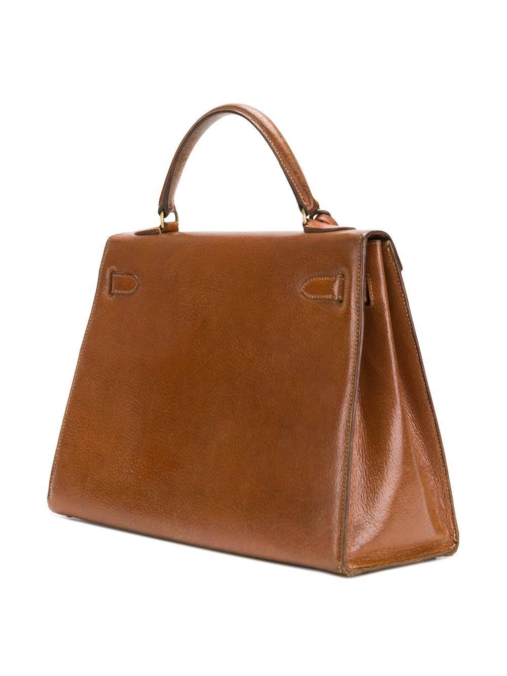 Rare beauty of the 60s, Hermes Kelly handbag made of Pecari leather, gold hardware. Gorgeous gold leather color, exceptional and strong quality of leather. It can last forever !

Marked: Hermès Paris
Size: 32 cm
Excellent vintage condition