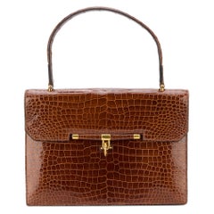 Vintage Hermes Palonnier crocodile and gold color hardware Bag, 1960s  