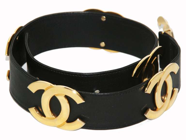 Just fantastic and so unusual to find! Black Leather Chanel Belt of the 90s, Marked Chanel Paris Made in France. 6 Large CC in gold plated metal. Size of Chanel logo: 6.5 x 5 cm - 2.5 x 2 in. Max Length: 75 cm -  29.5 in. Excellent condition.