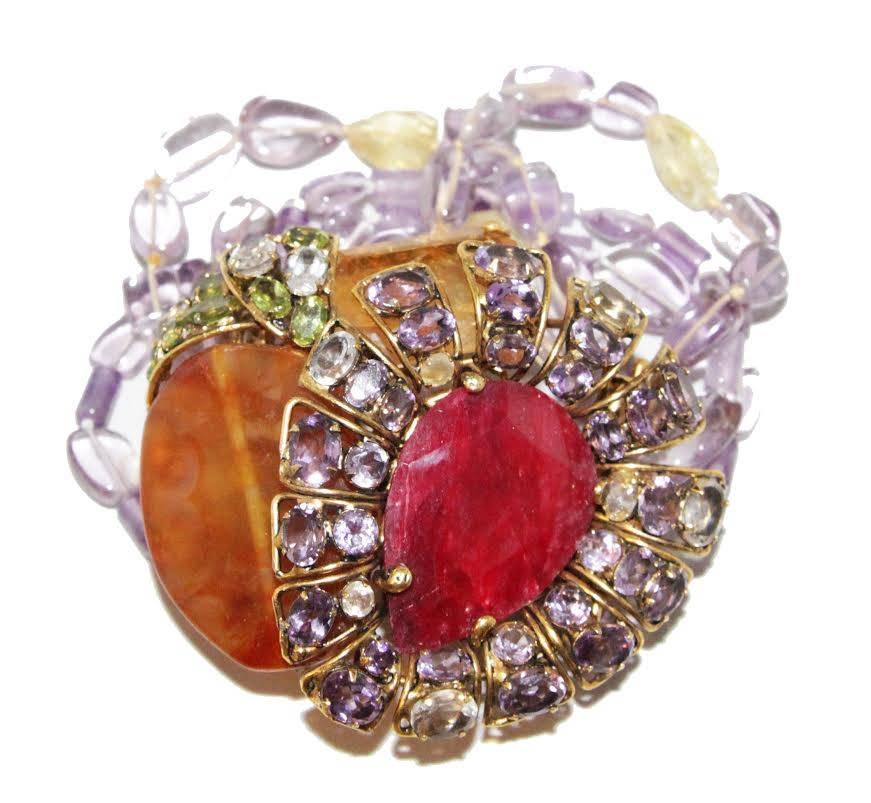 Gorgeous semi-precious bracelet. Adjustable brooch. Signed C&D, 925, vermeil. Made in amethyst, citrine, peridot & aghate. 

Excellent vintage condition. Bracelet size : 20 x 5 cm -  7.9 x 2 in. - Brooch size : 7.5 x 6.5 cm - 3 x 2.6 in. 