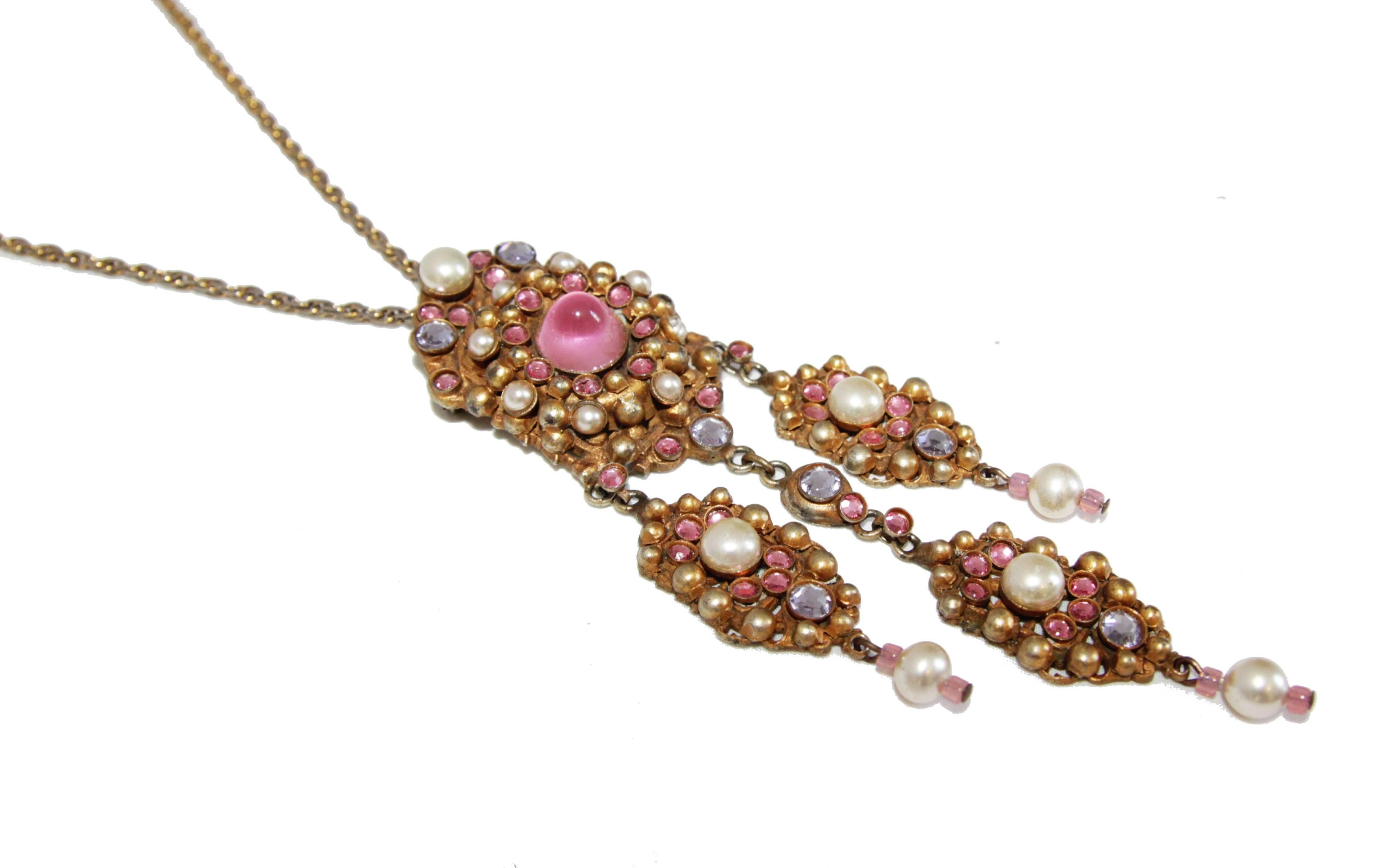 Fabulous French Couture Henry vintage necklace/brooch, circa : 1960.  Made of bronze, simulated pearls, crystal and glass. Marked : Henry

Henry is a jeweler from Lyon in the 50s years. He was one of the first to develop costume jewelery. Its