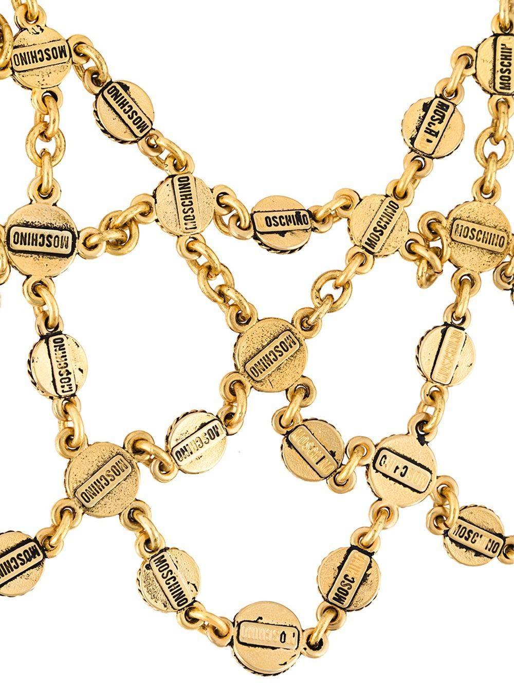 A great, fun and collectable Moschino vintage couture necklace made by Correani for Moschino, c.1980. Made of gilt metal. Excellent vintage condition. Size: Circumference: 48 cm - 19 in, width: 11 cm - 4 1/3 in.