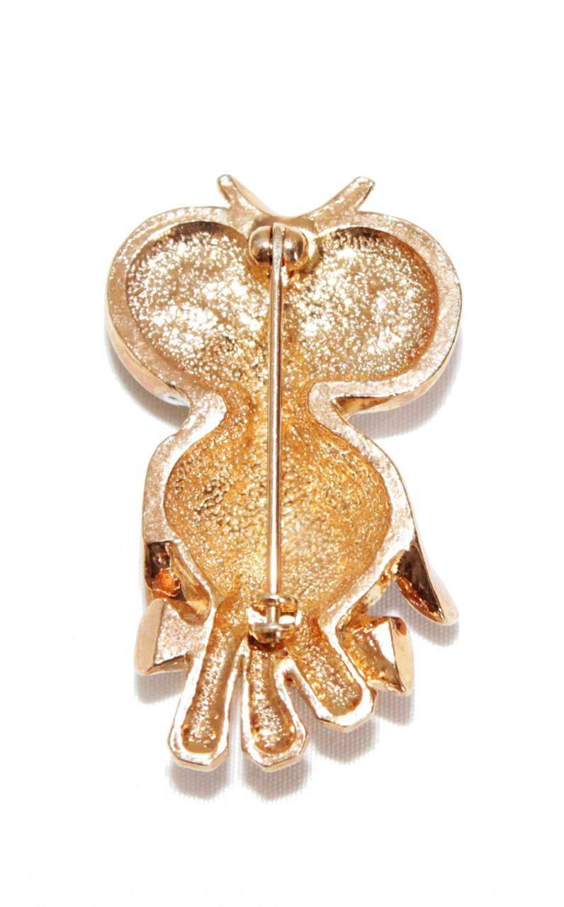 Sparkling little crystal owl vintage brooch of the 60s. Made of gilt metal and crystal. Excellent vintage condition. Size : 4 x 2.5 cm - 1.6 x 1 in.  