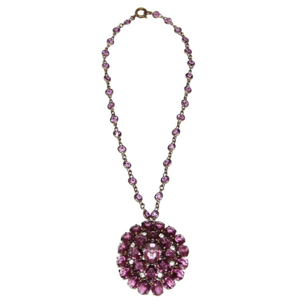 Unique & very delicate purple faceted glass & crystal necklace, circa 1910. Made of metal, crystal and glass.

Size : chain : 46 cm - pendant : 5 x 5.5 cm - 2 x 2.2 in. 

Excellent vintage condition.