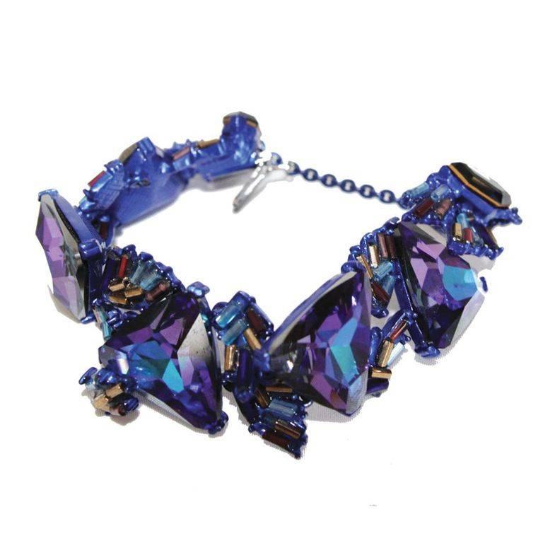 Rare & gorgeous Christian Lacroix blue faceted bracelet, c.1990. Highly collectable. Made of blue faceted crystal and multi-colored baguette beads. 

Marked : Christian Lacroix Made in France 

Size : 19 x 2.5 cm - 7.5 x 1 in. 

Excellent
