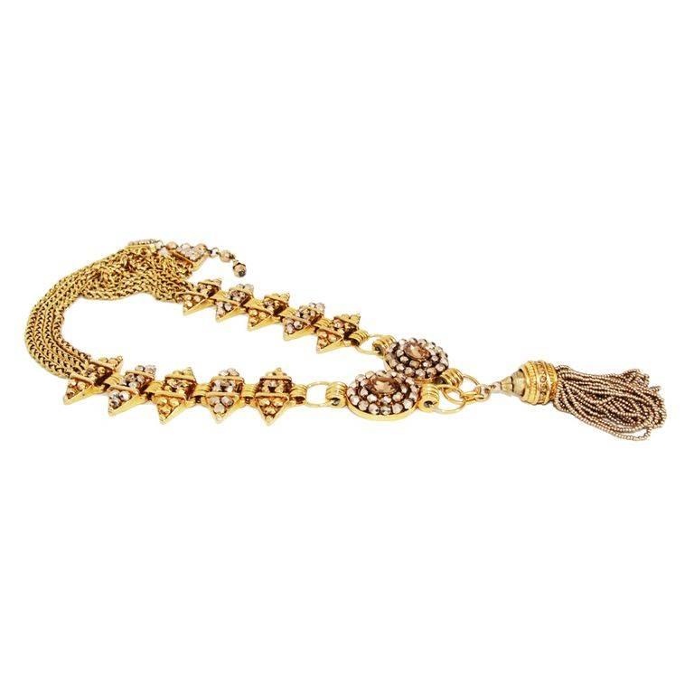 Spectacular and collectable Claire Dévé french necklace of the late 80s. Made of gilt metal, faceted crystal beads and stones. 

Marked : Claire Dévé

Size : 94 x 5.5 cm - 37 x 2.2 in. Pendant : 10 x 5 cm - 4 x 2 in.

Excellent condition. 